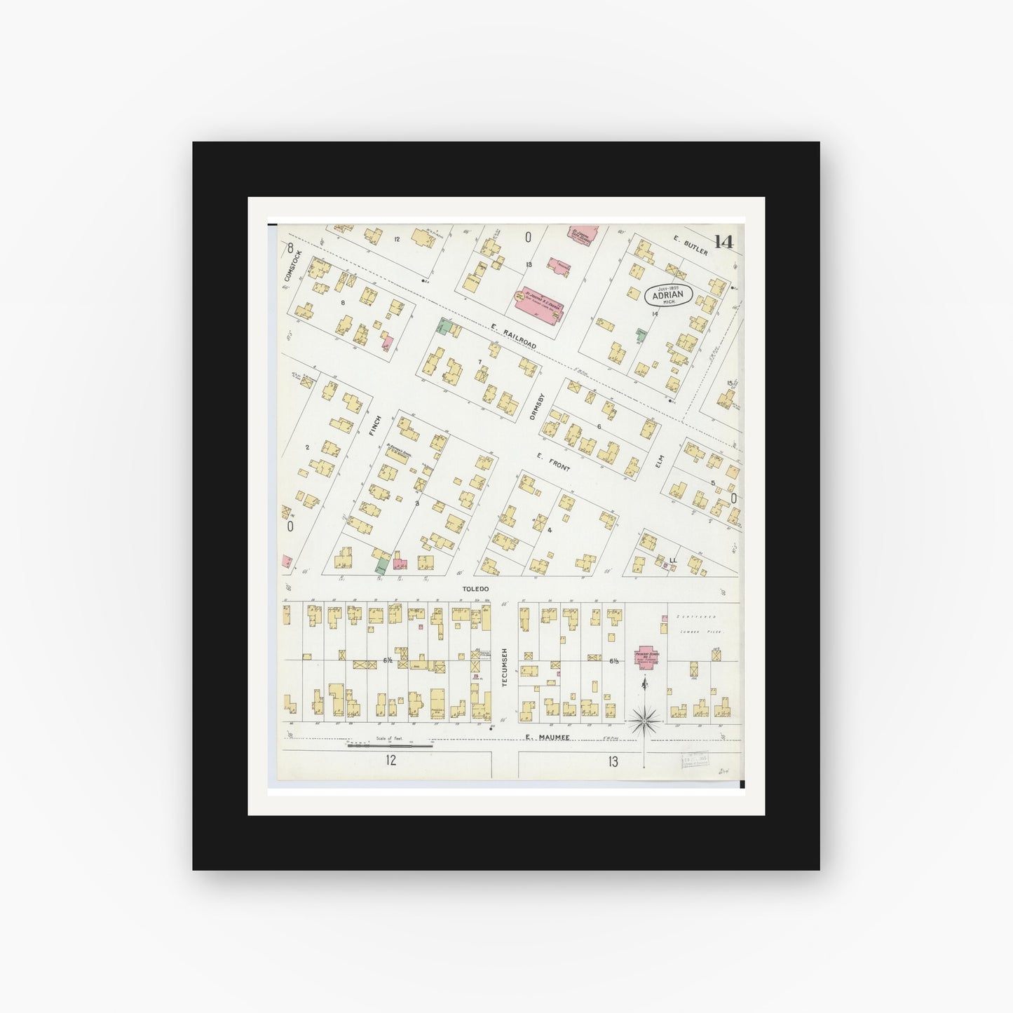 Old map wall art mockup — black gallery frame with white mat — Sanborn Fire Insurance Map from Adrian, Lenawee County, Michigan (1899), Sheet #0014