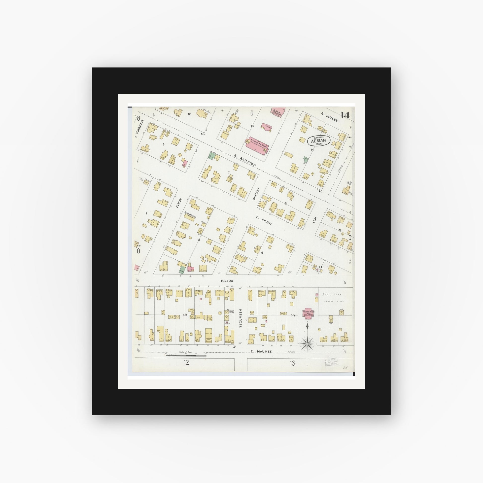 Old map wall art mockup — black gallery frame with white mat — Sanborn Fire Insurance Map from Adrian, Lenawee County, Michigan (1899), Sheet #0014