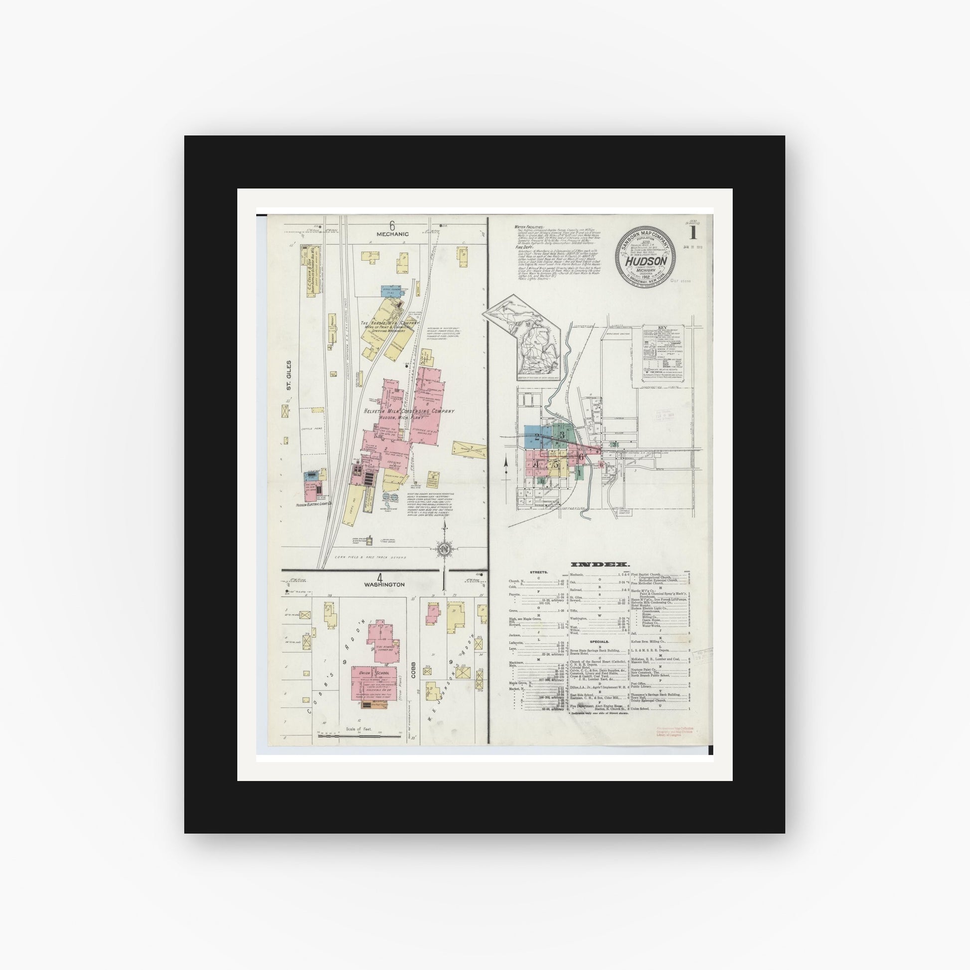 Old map wall art mockup — black gallery frame with white mat — Sanborn Fire Insurance Map from Hudson, Lenawee County, Michigan (1912) - Complete Map Set