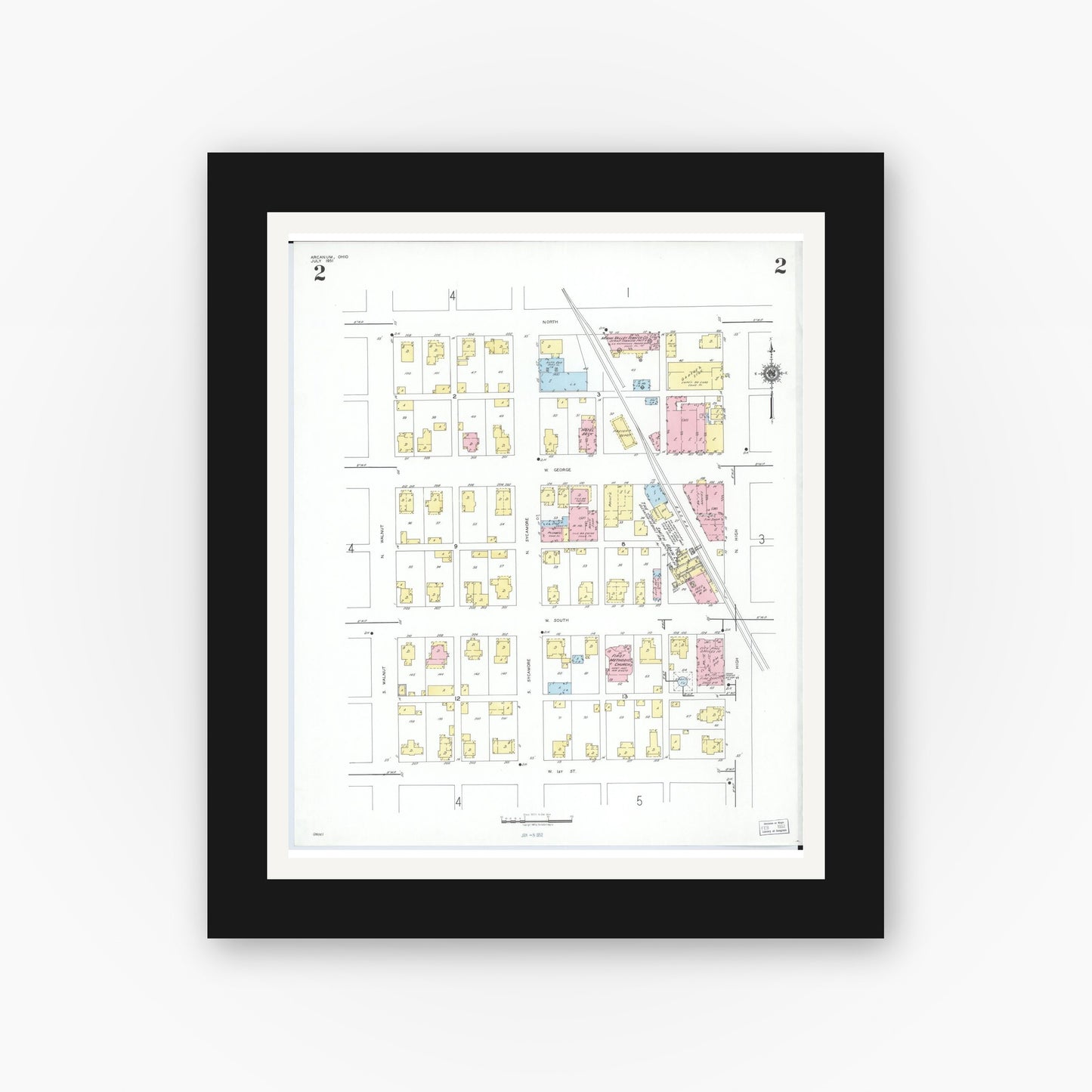 Old map wall art mockup — black gallery frame with white mat — Sanborn Fire Insurance Map from Arcanum, Darke County, Ohio (1951), Sheet #0002