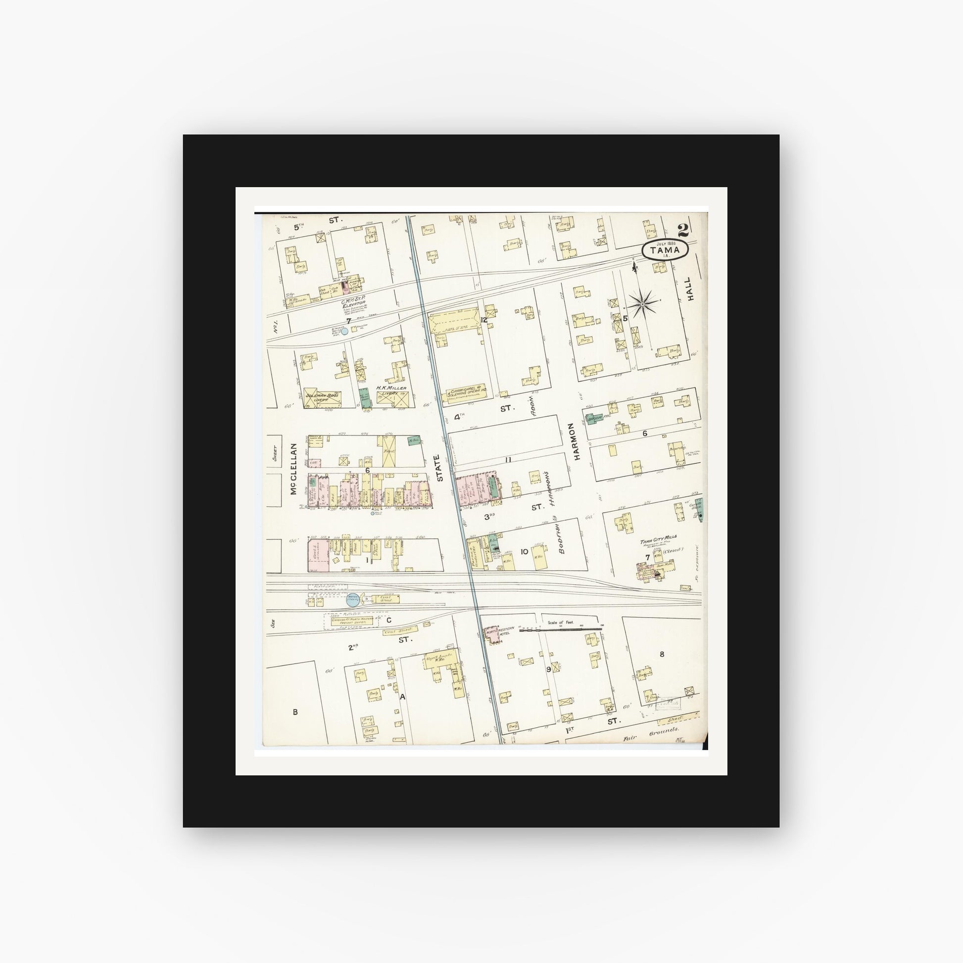 Old map wall art mockup — black gallery frame with white mat — Sanborn Fire Insurance Map from Tama, Tama County, Iowa (1888), Sheet #0002