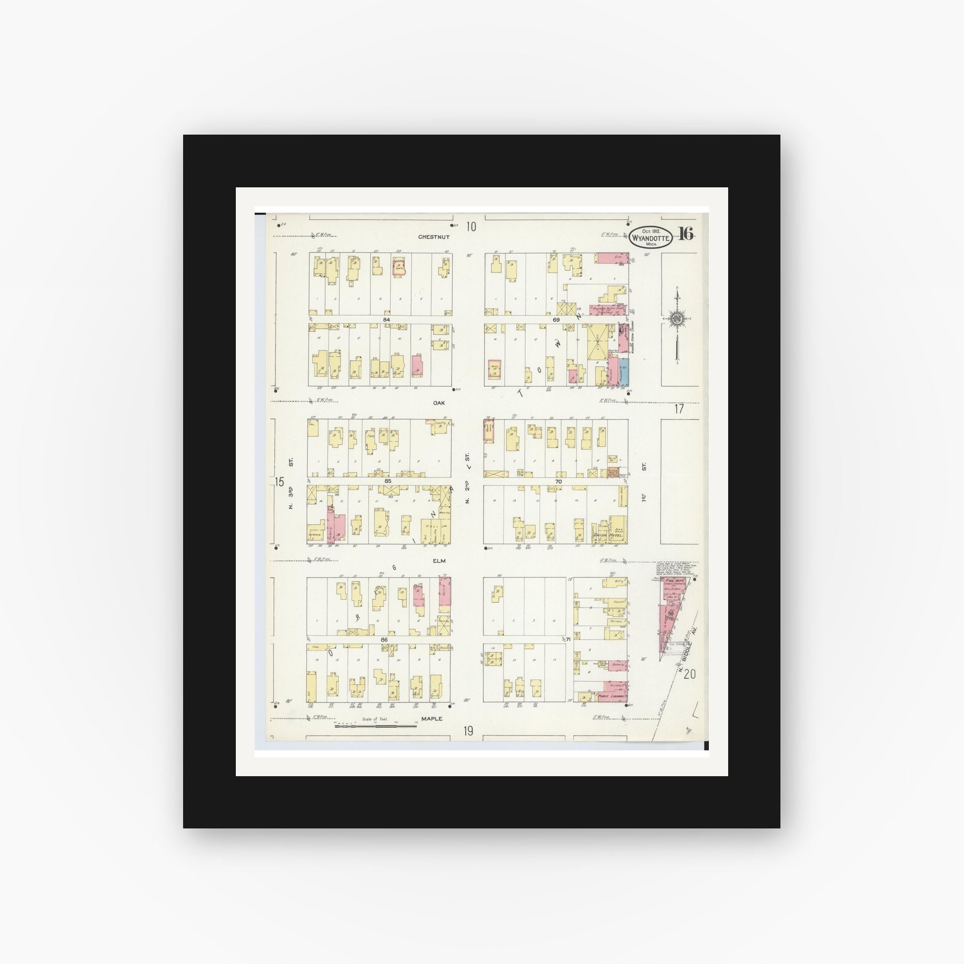 Old map wall art mockup — black gallery frame with white mat — Sanborn Fire Insurance Map from Wyandotte, Wayne County, Michigan (1912), Sheet #0016