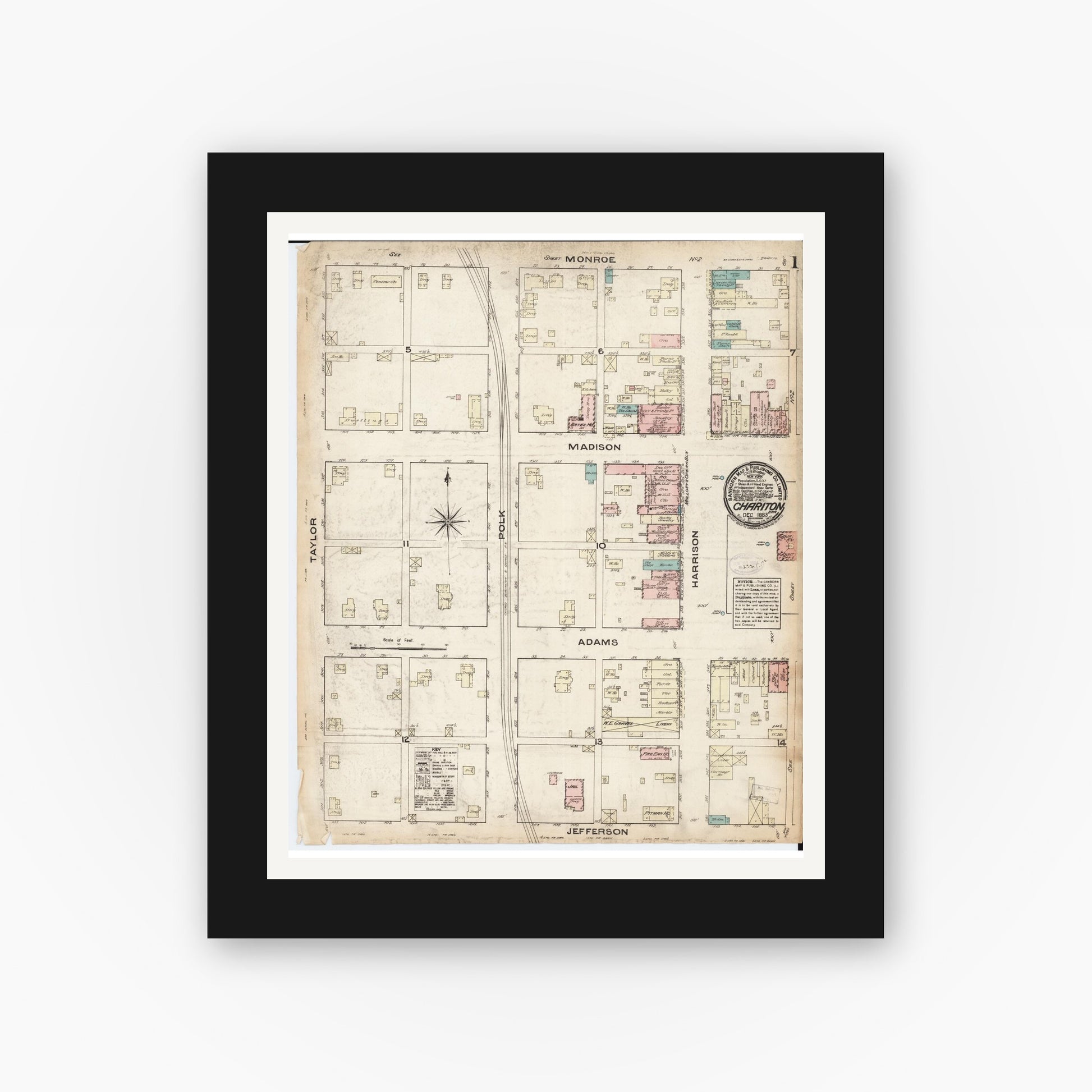 Old map wall art mockup — black gallery frame with white mat — Sanborn Fire Insurance Map from Chariton, Lucas County, Iowa (1883) â€” Complete Set