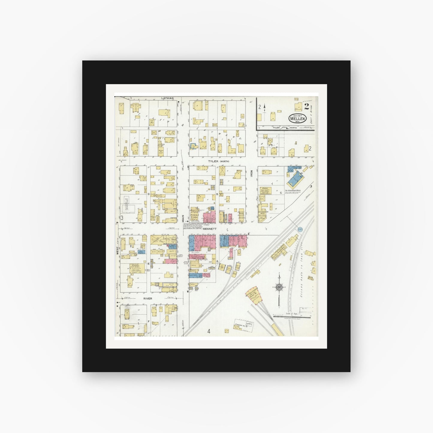 Old map wall art mockup — black gallery frame with white mat — Sanborn Fire Insurance Map from Mellen, Ashland County, Wisconsin (1917), Sheet #0002