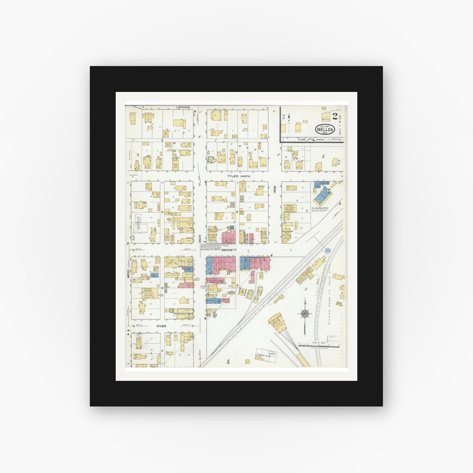 Old map wall art mockup — black gallery frame with white mat — Sanborn Fire Insurance Map from Mellen, Ashland County, Wisconsin (1917), Sheet #0002