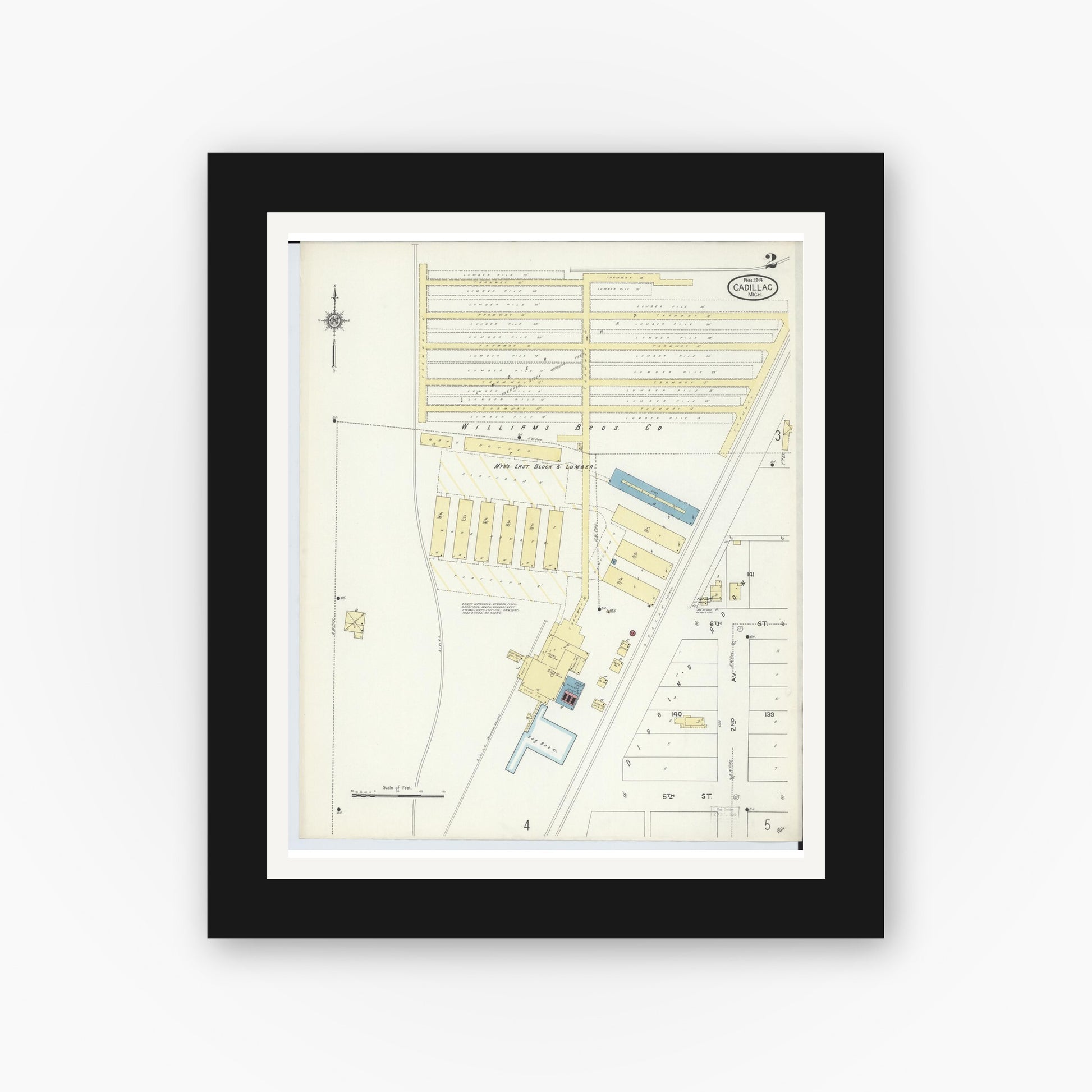Old map wall art mockup — black gallery frame with white mat — Sanborn Fire Insurance Map from Cadillac, Wexford County, Michigan (1914), Sheet #0002