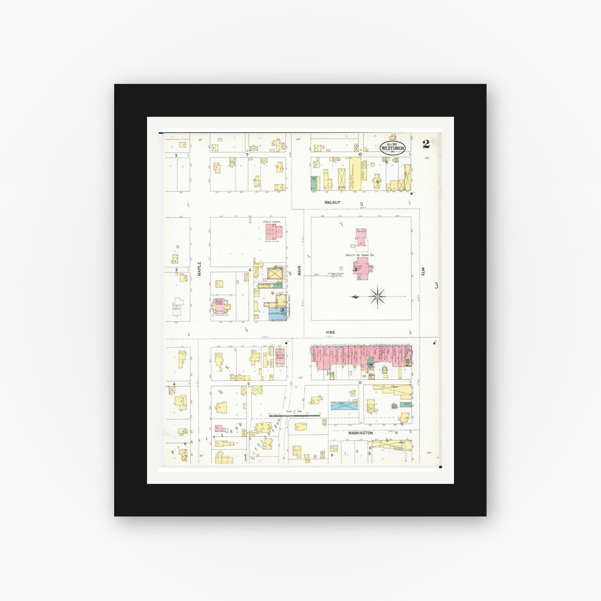 Old map wall art mockup — black gallery frame with white mat — Sanborn Fire Insurance Map from West Union, Fayette County, Iowa (1902), Sheet #0002