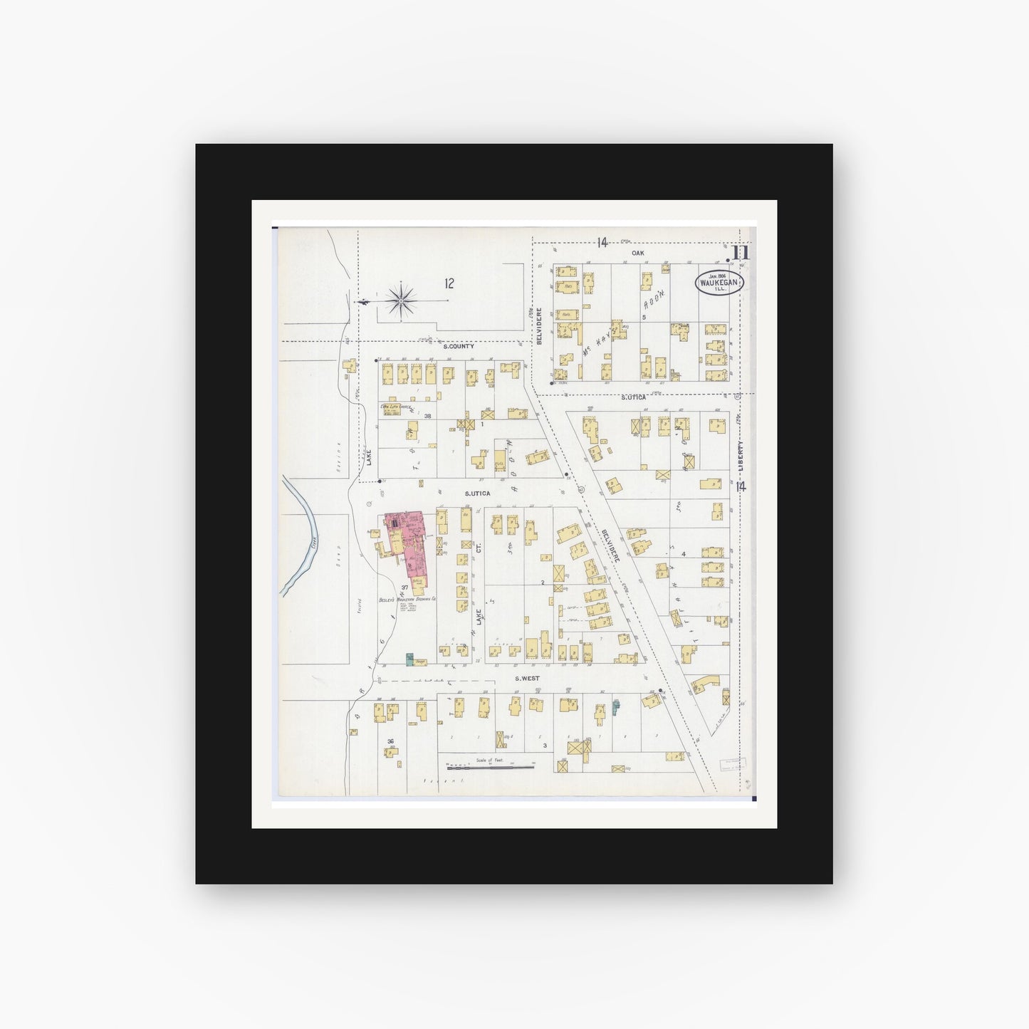 Old map wall art mockup — black gallery frame with white mat — Sanborn Fire Insurance Map from Waukegan, Lake County, Illinois (1906), Sheet #0011