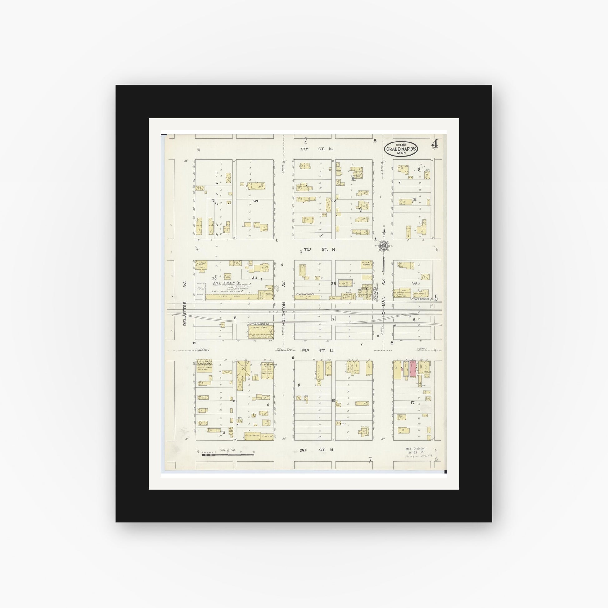 Old map wall art mockup — black gallery frame with white mat — Sanborn Fire Insurance Map from Grand Rapids, Itasca County, Minnesota (1913), Sheet #0004
