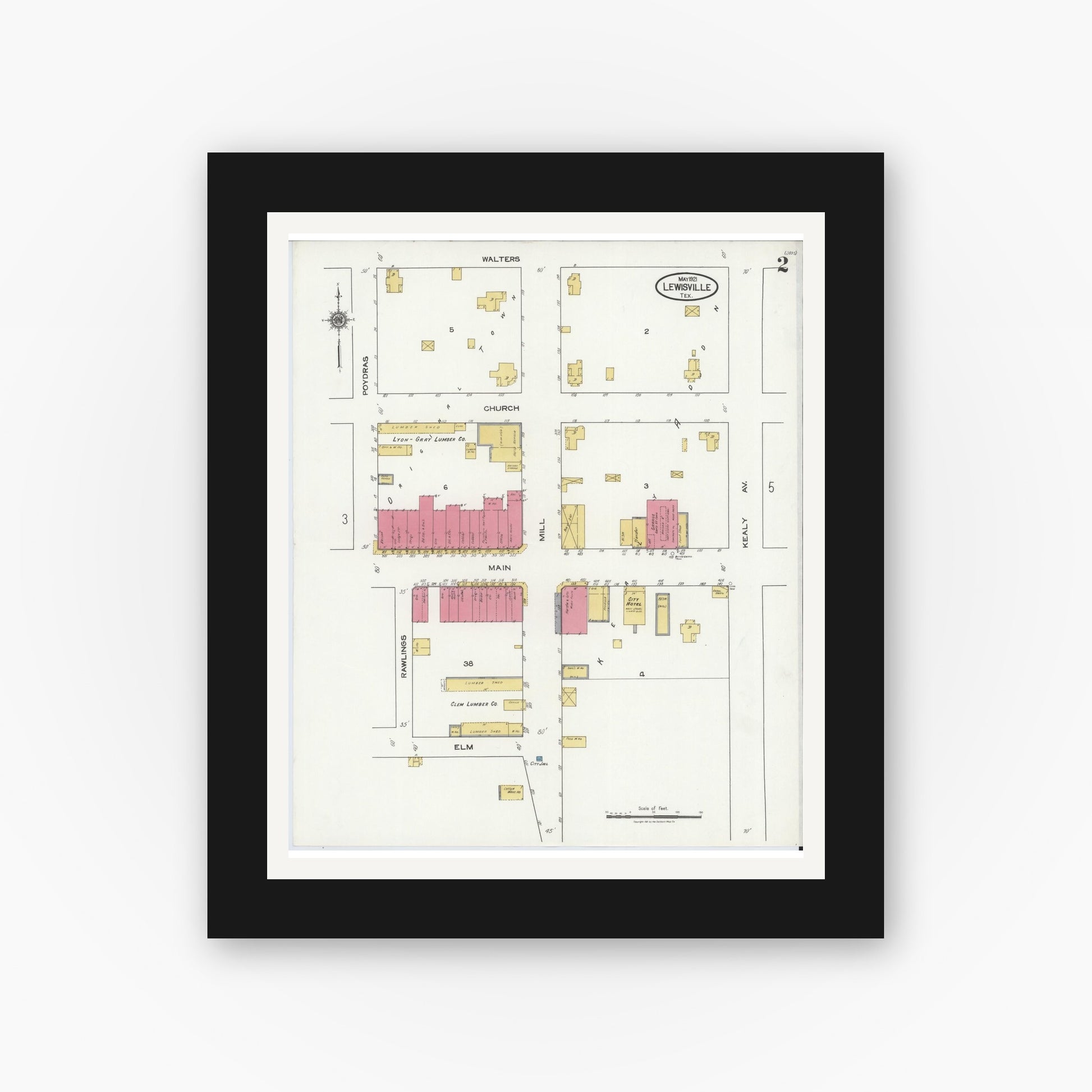 Old map wall art mockup — black gallery frame with white mat — Sanborn Fire Insurance Map from Lewisville, Denton County, Texas (1921), Sheet #0002