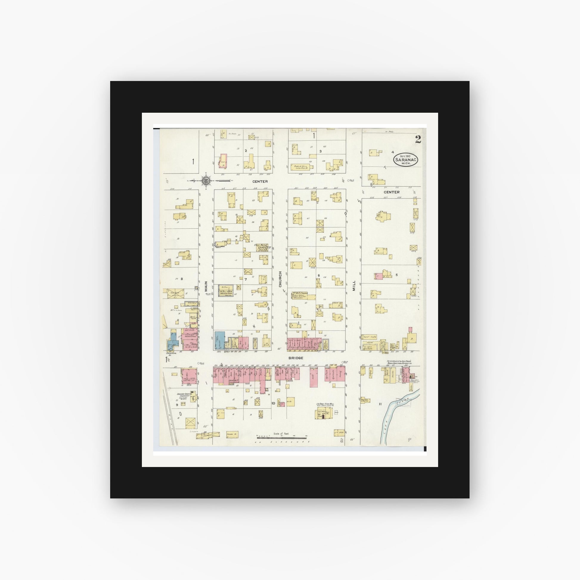 Old map wall art mockup — black gallery frame with white mat — Sanborn Fire Insurance Map from Saranac, Ionia County, Michigan (1910), Sheet #0002
