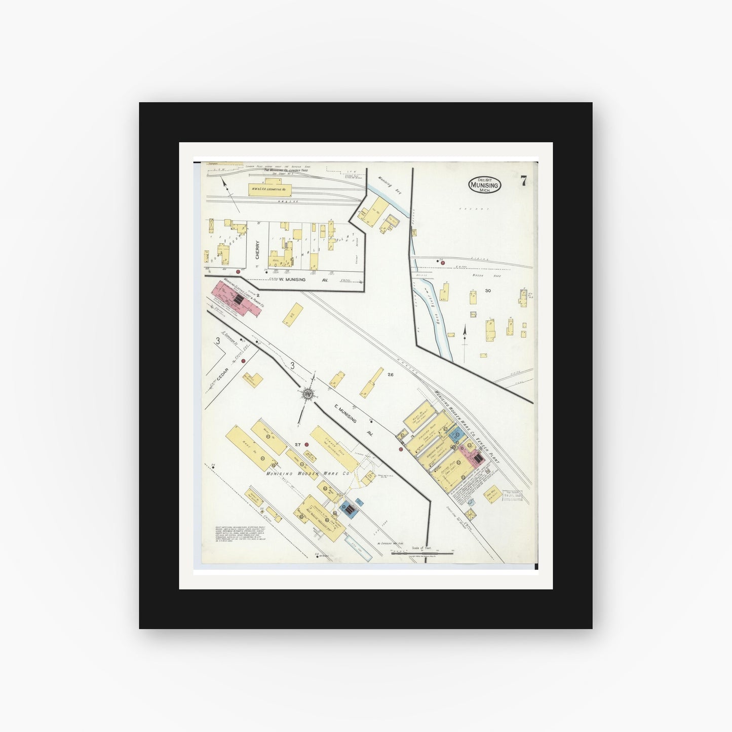 Old map wall art mockup — black gallery frame with white mat — Sanborn Fire Insurance Map from Munising, Alger County, Michigan (1917), Sheet #0007