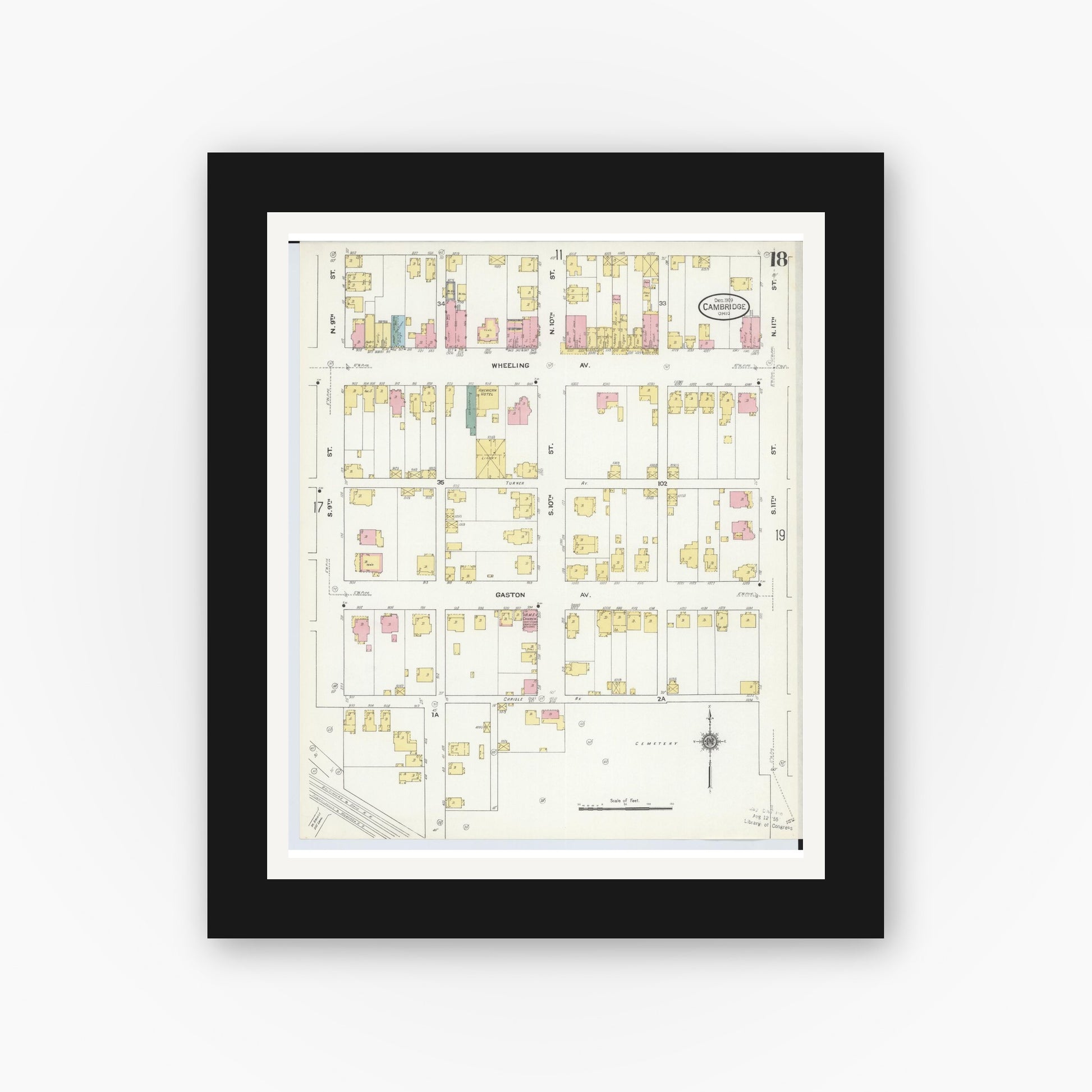 Old map wall art mockup — black gallery frame with white mat — Sanborn Fire Insurance Map from Cambridge, Guernsey County, Ohio (1909), Sheet #0018