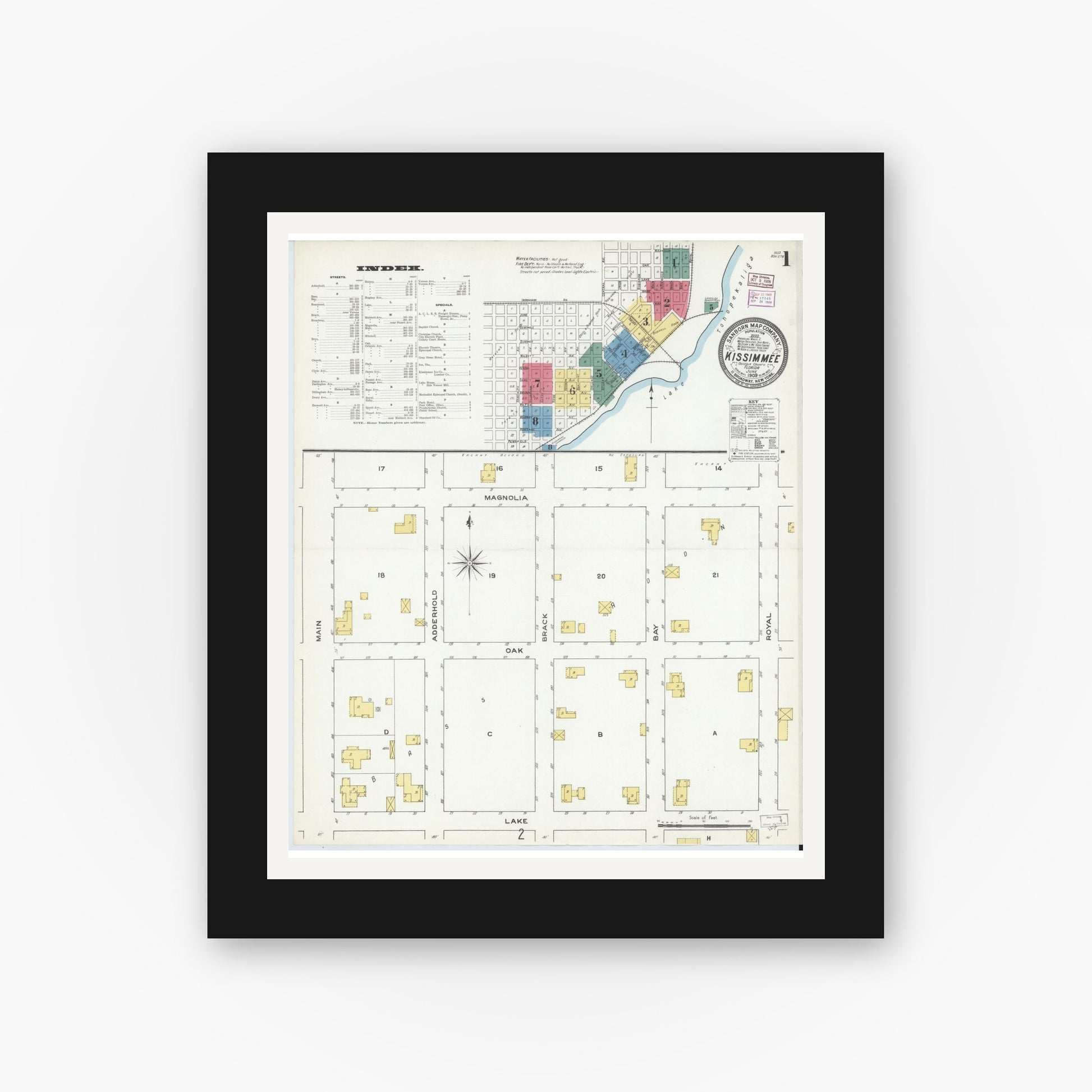 Old map wall art mockup — black gallery frame with white mat — Sanborn Fire Insurance Map from Kissimmee, Osceola County, Florida (1909), Sheet #0001