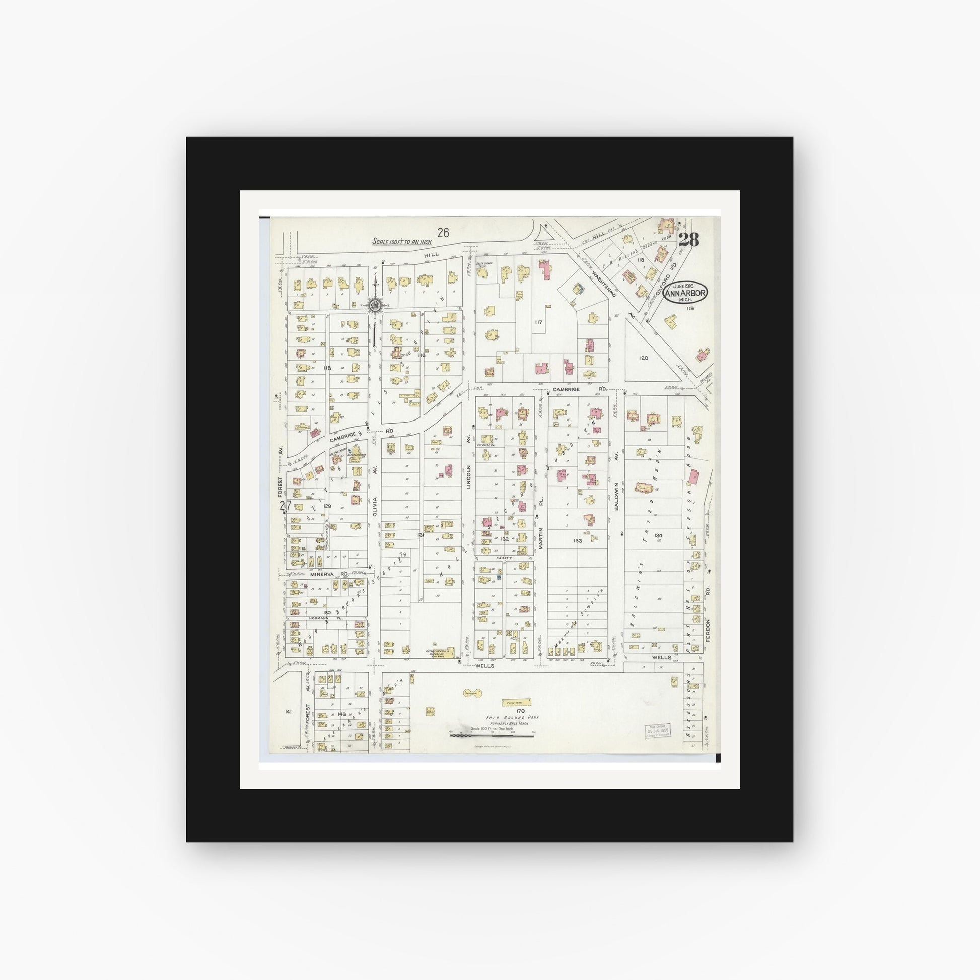 Old map wall art mockup — black gallery frame with white mat — Sanborn Fire Insurance Map from Ann Arbor, Washtenaw County, Michigan (1916), Sheet #0028