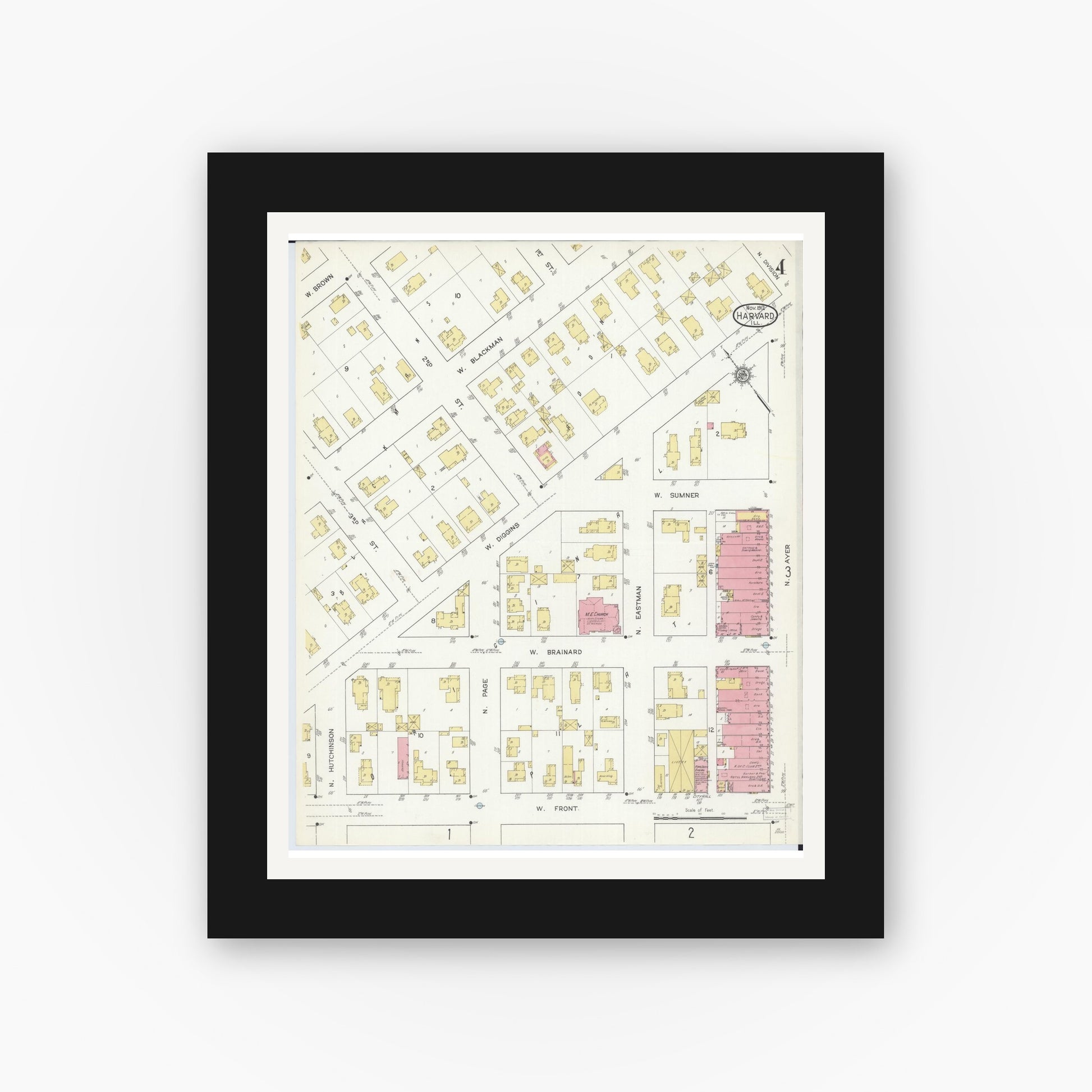 Old map wall art mockup — black gallery frame with white mat — Sanborn Fire Insurance Map from Harvard, McHenry County, Illinois (1912), Sheet #0004