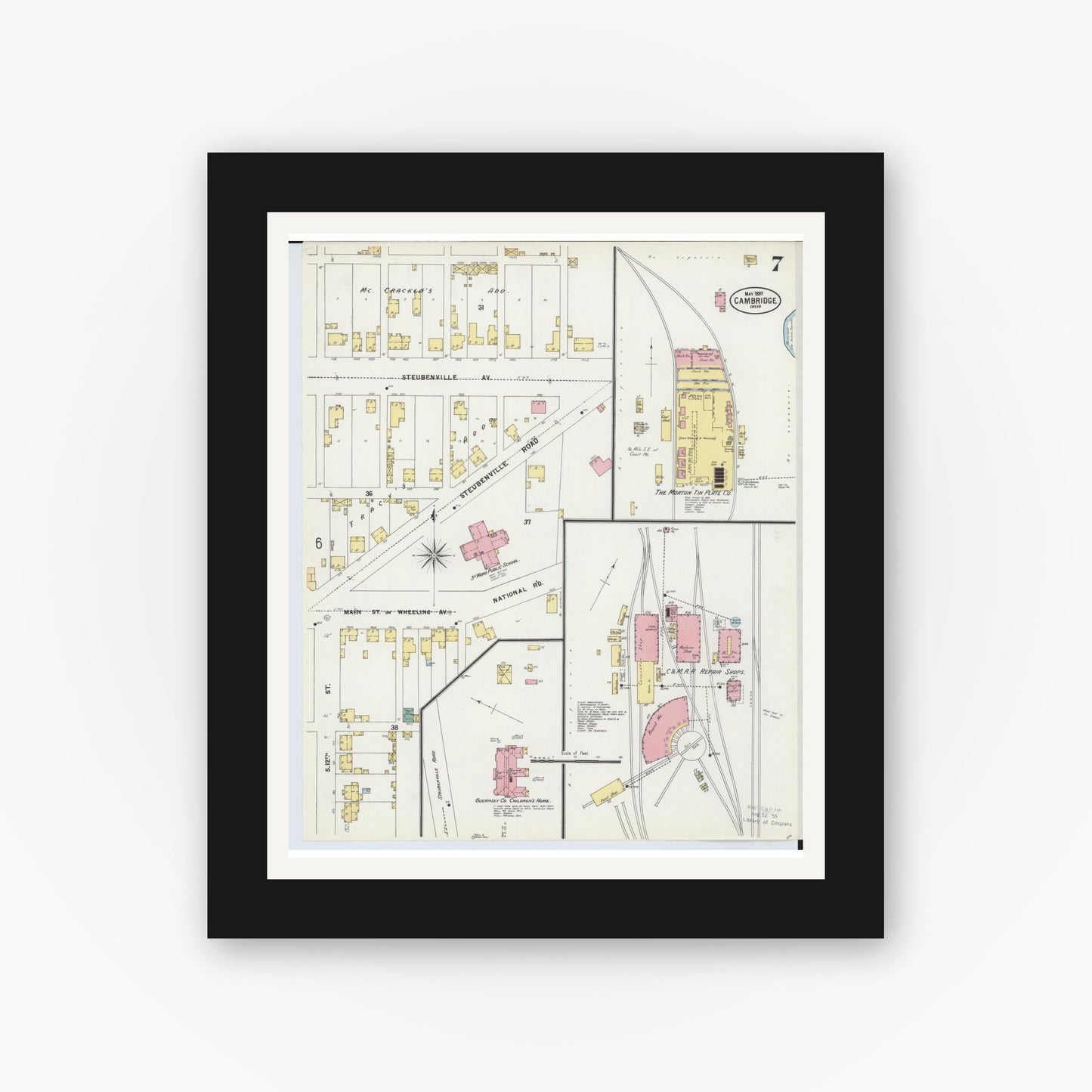 Old map wall art mockup — black gallery frame with white mat — Sanborn Fire Insurance Map from Cambridge, Guernsey County, Ohio (1897), Sheet #0007
