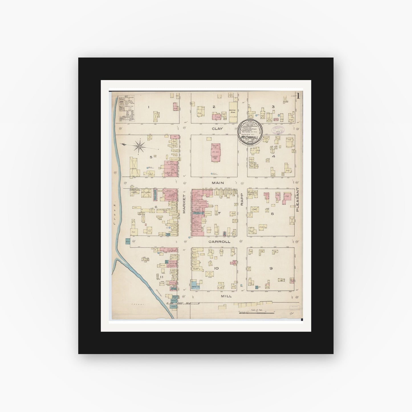 Old map wall art mockup — black gallery frame with white mat — Sanborn Fire Insurance Map from Mount Carroll, Carroll County, Illinois (1885), Sheet #0001