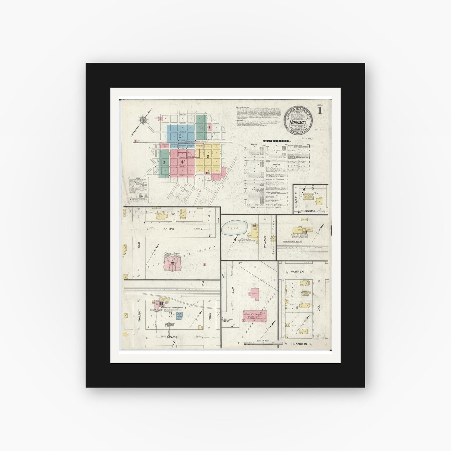 Old map wall art mockup — black gallery frame with white mat — Sanborn Fire Insurance Map from Nokomis, Montgomery County, Illinois (1912), Sheet #0001