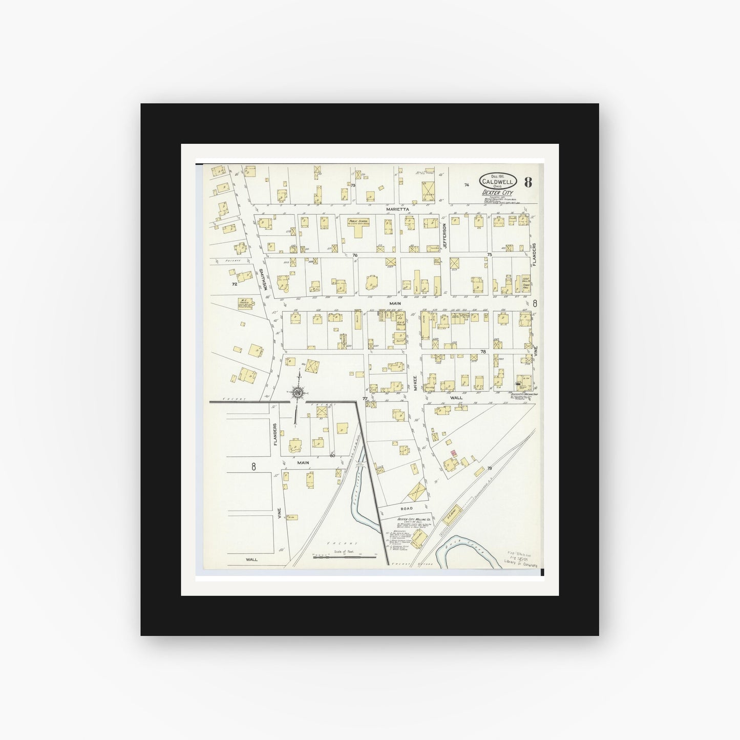 Old map wall art mockup — black gallery frame with white mat — Sanborn Fire Insurance Map from Caldwell, Noble County, Ohio (1911), Sheet #0008