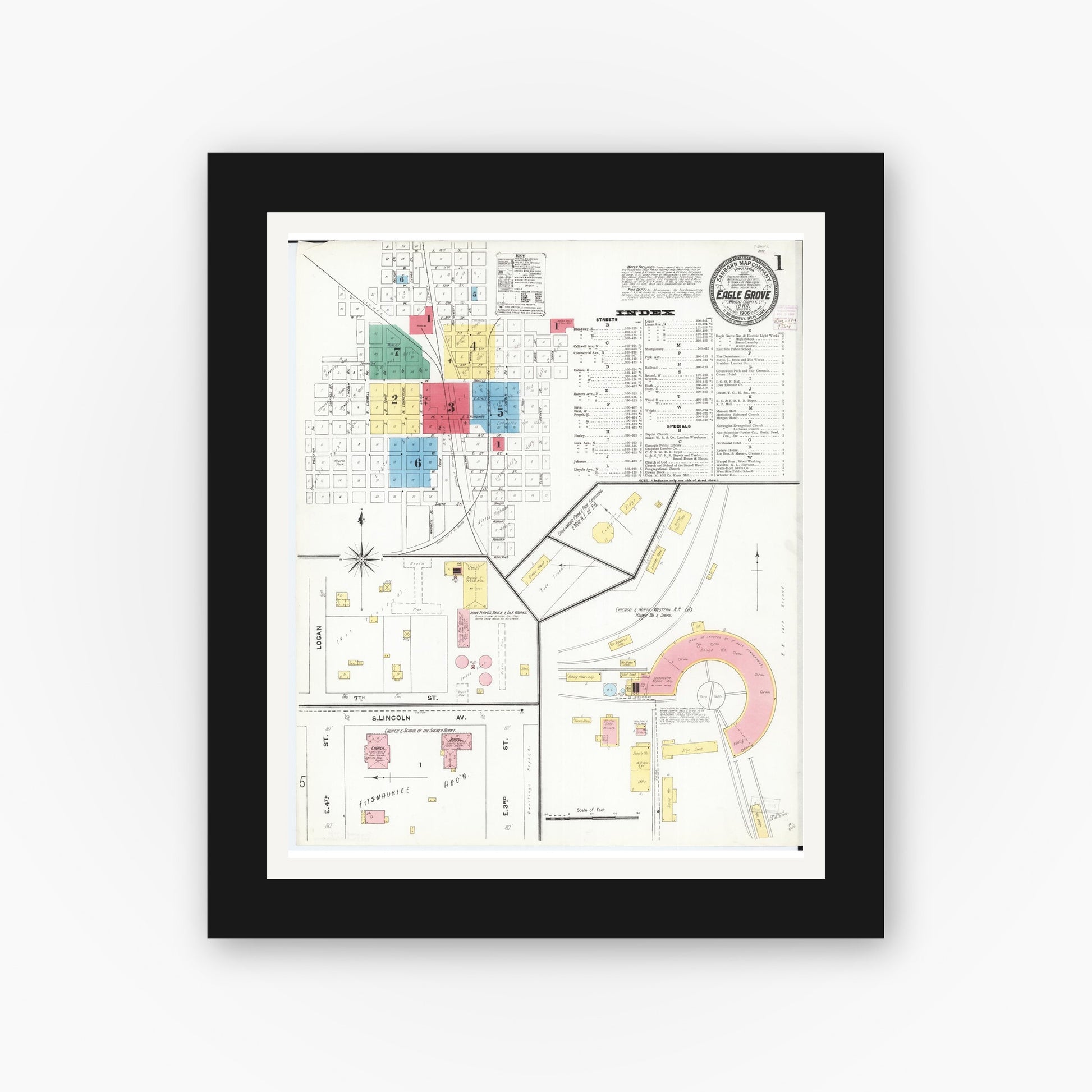 Old map wall art mockup — black gallery frame with white mat — Sanborn Fire Insurance Map from Eagle Grove, Wright County, Iowa (1906) â€” Complete Set