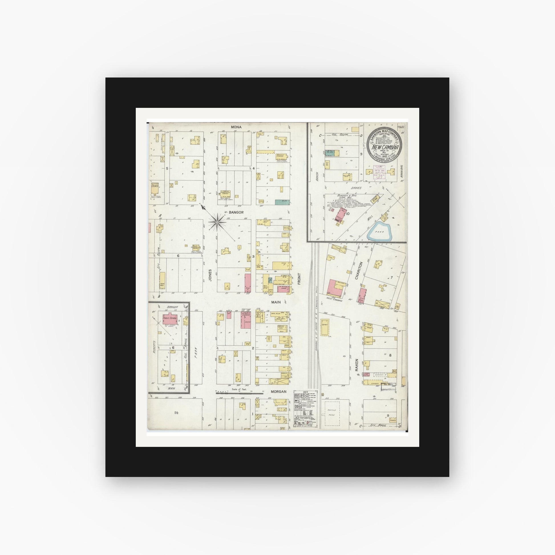 Old map wall art mockup — black gallery frame with white mat — Sanborn Fire Insurance Map from New Cambria, Macon County, Missouri (1892), Sheet #0001