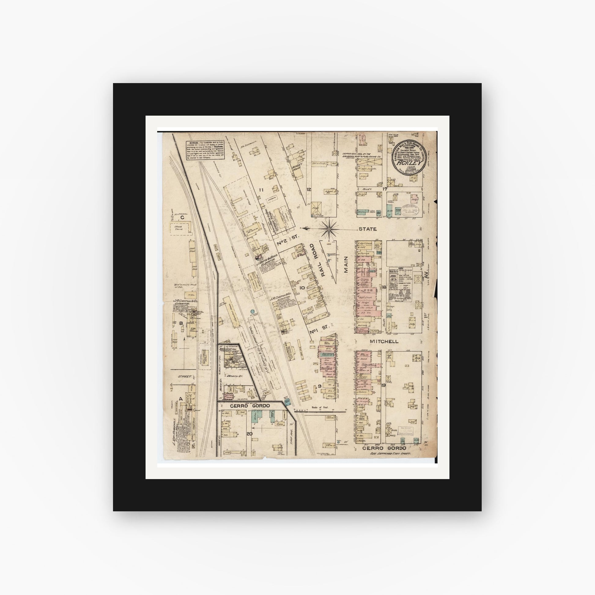 Old map wall art mockup — black gallery frame with white mat — Sanborn Fire Insurance Map from Ackley, Hardin and Franklin Counties, Iowa (1883), Sheet #0001