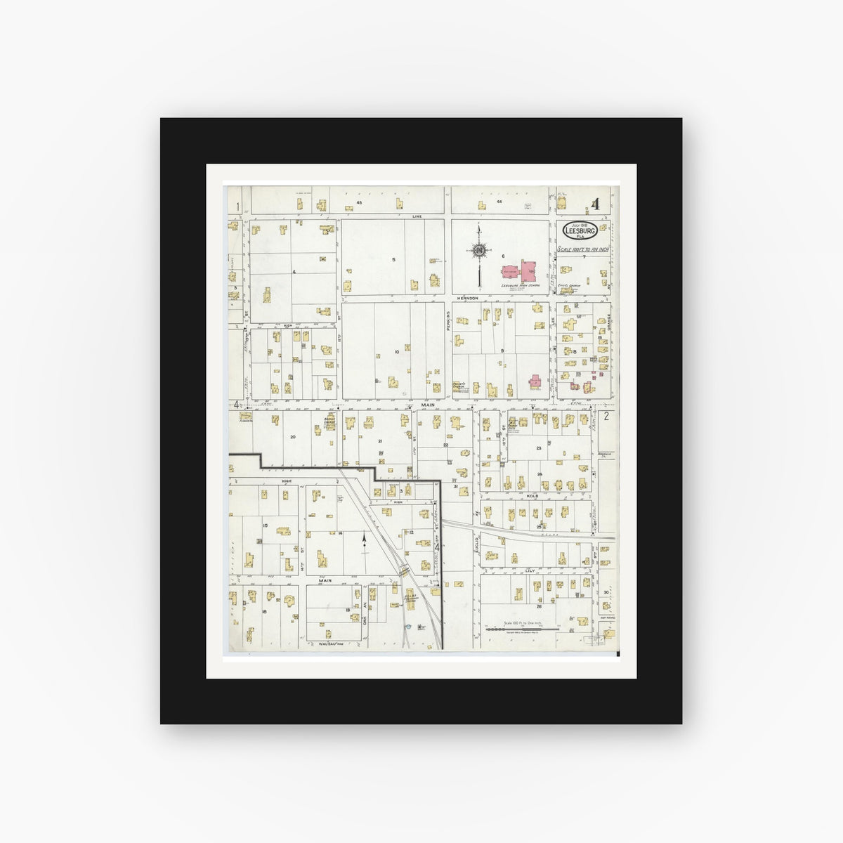 Old map wall art mockup — black gallery frame with white mat — Sanborn Fire Insurance Map from Leesburg, Lake County, Florida (1918), Sheet #0004