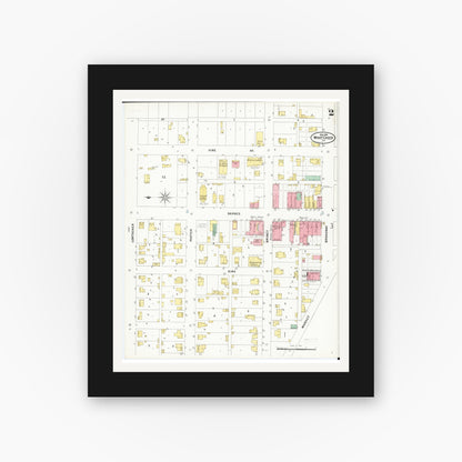 Old map wall art mockup — black gallery frame with white mat — Sanborn Fire Insurance Map from What Cheer, Keokuk County, Iowa (1899), Sheet #0002