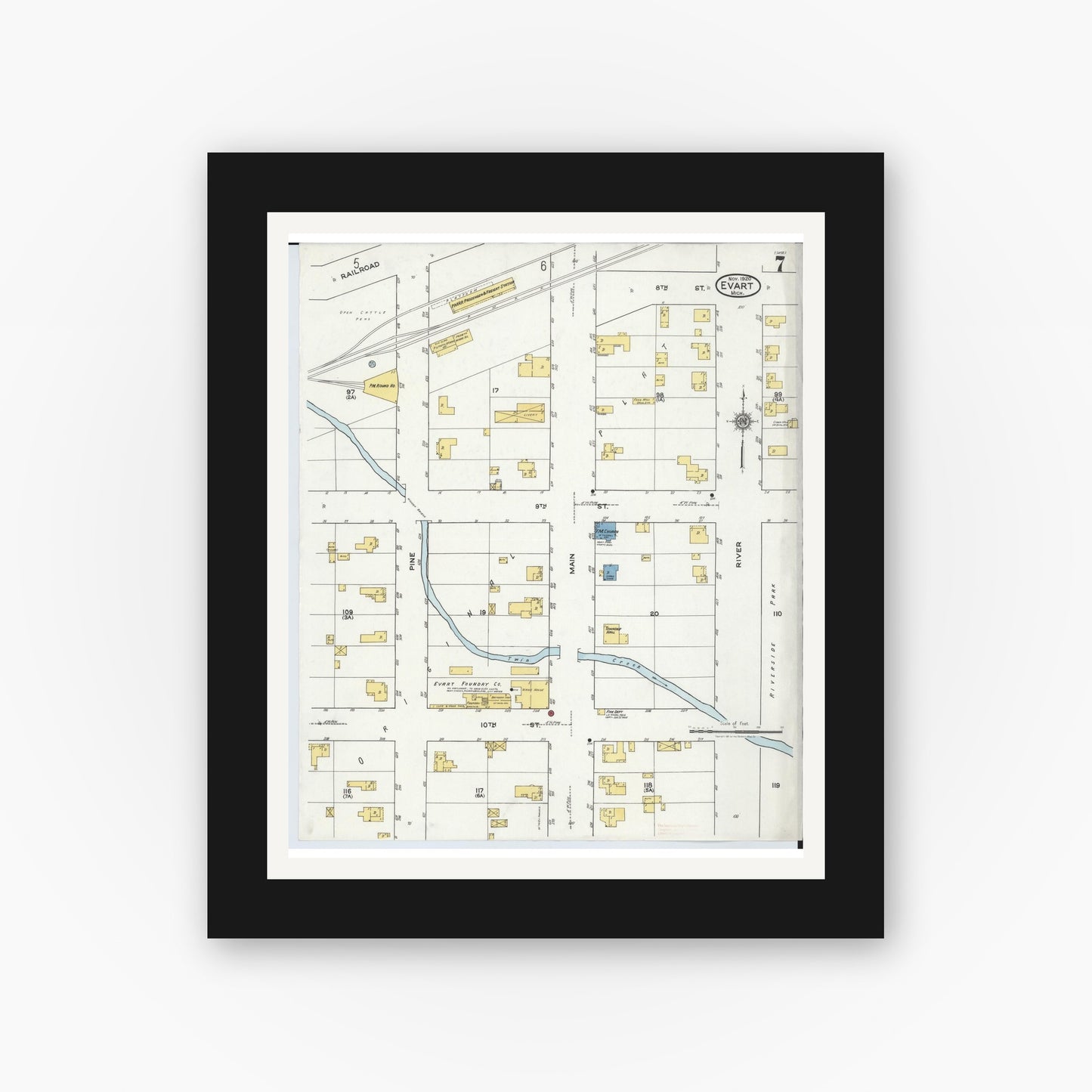 Old map wall art mockup — black gallery frame with white mat — Sanborn Fire Insurance Map from Evart, Osceola County, Michigan (1920), Sheet #0007