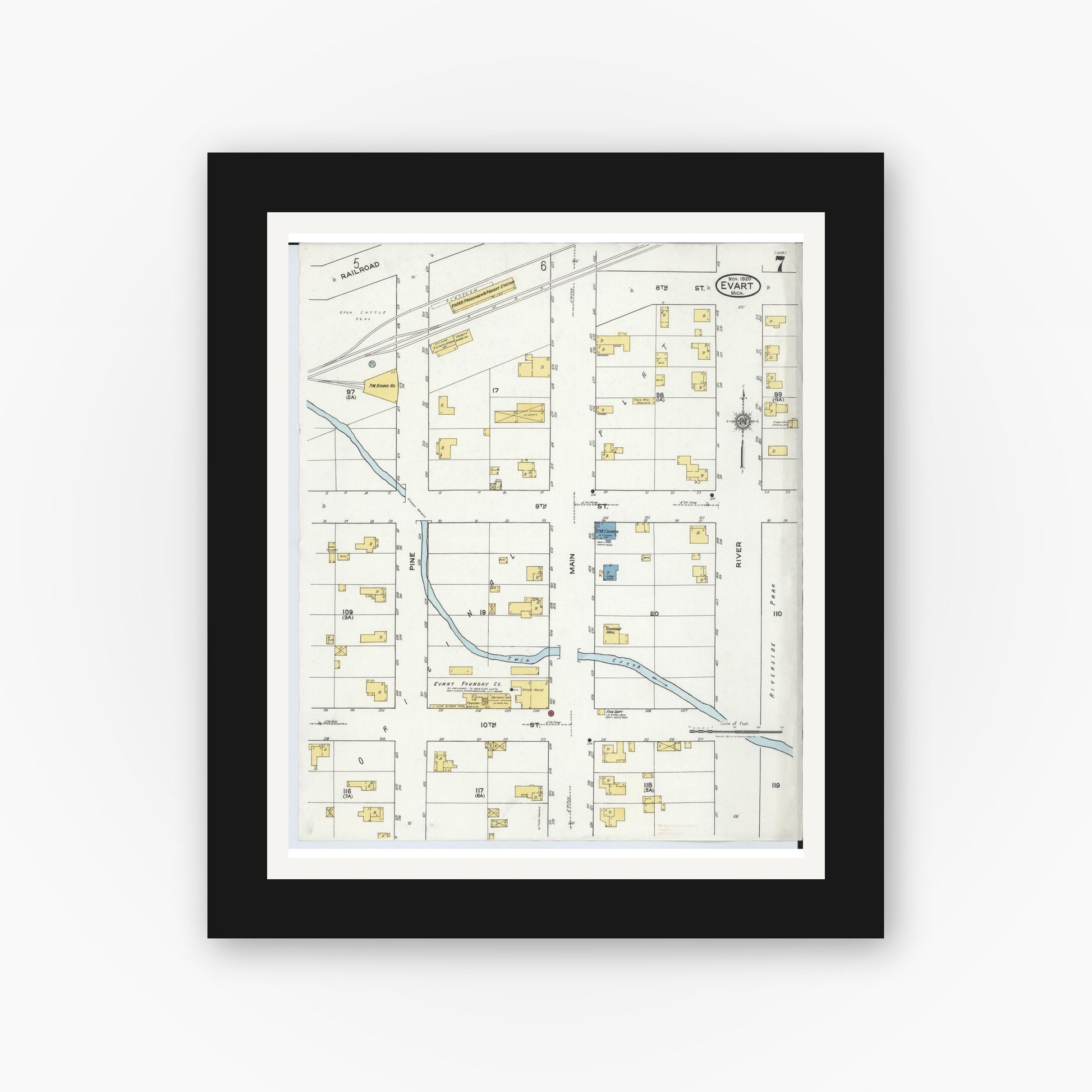 Old map wall art mockup — black gallery frame with white mat — Sanborn Fire Insurance Map from Evart, Osceola County, Michigan (1920), Sheet #0007