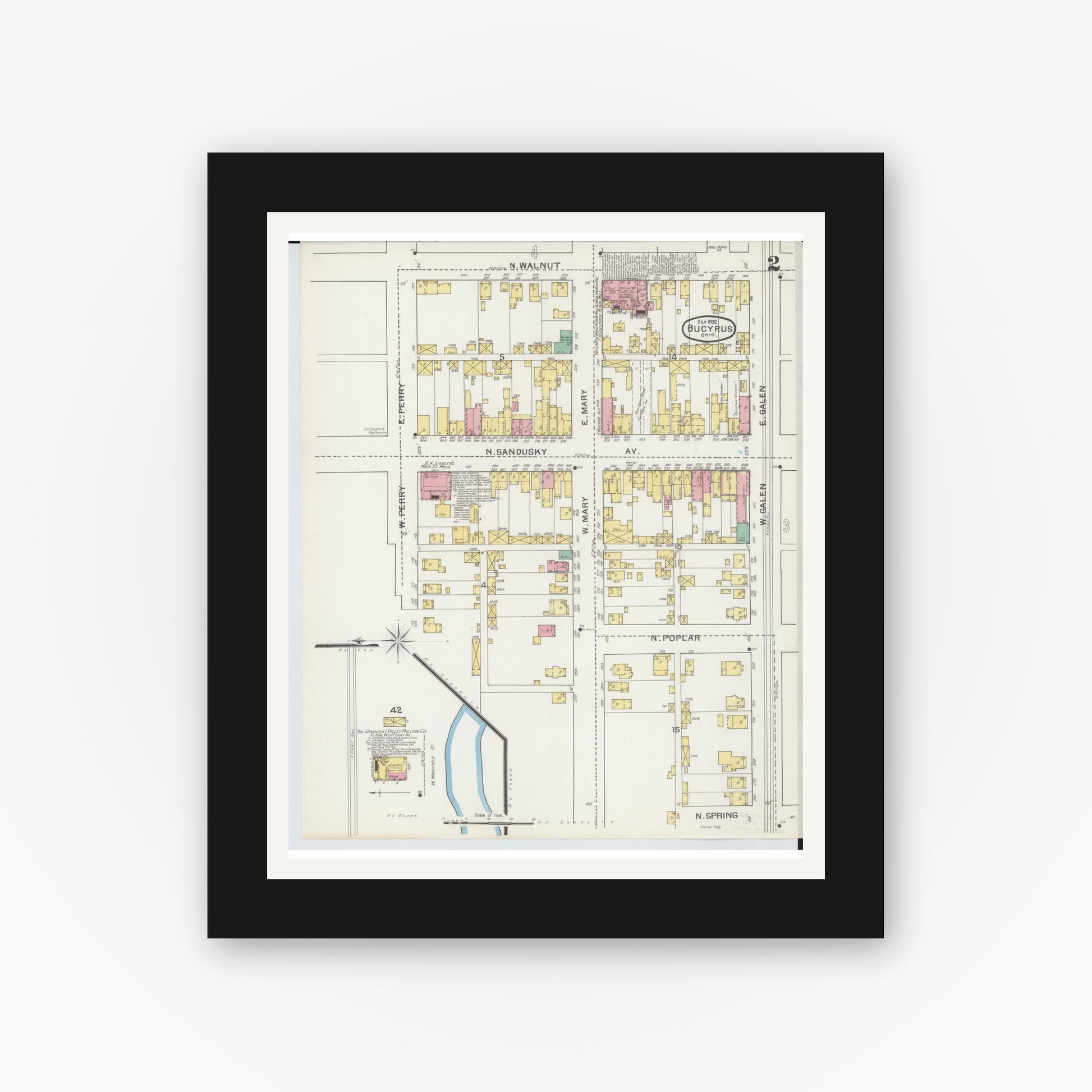 Old map wall art mockup — black gallery frame with white mat — Sanborn Fire Insurance Map from Bucyrus, Crawford County, Ohio (1892), Sheet #0002