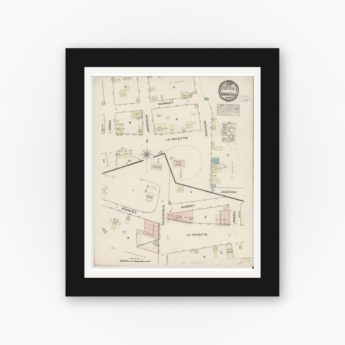 Old map wall art mockup — black gallery frame with white mat — Sanborn Fire Insurance Map from Marianna, Jackson County, Florida (1884), Sheet #0001