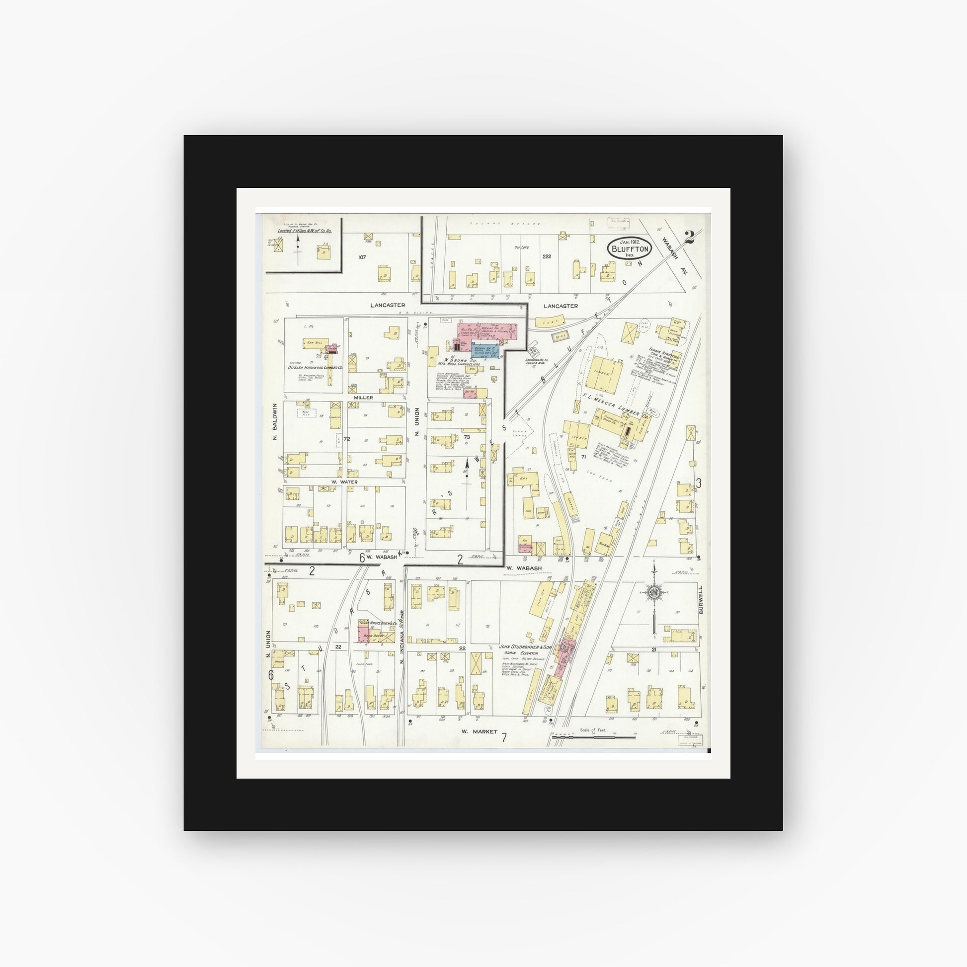 Old map wall art mockup — black gallery frame with white mat — Sanborn Fire Insurance Map from Bluffton, Wells County, Indiana (1912), Sheet #0002