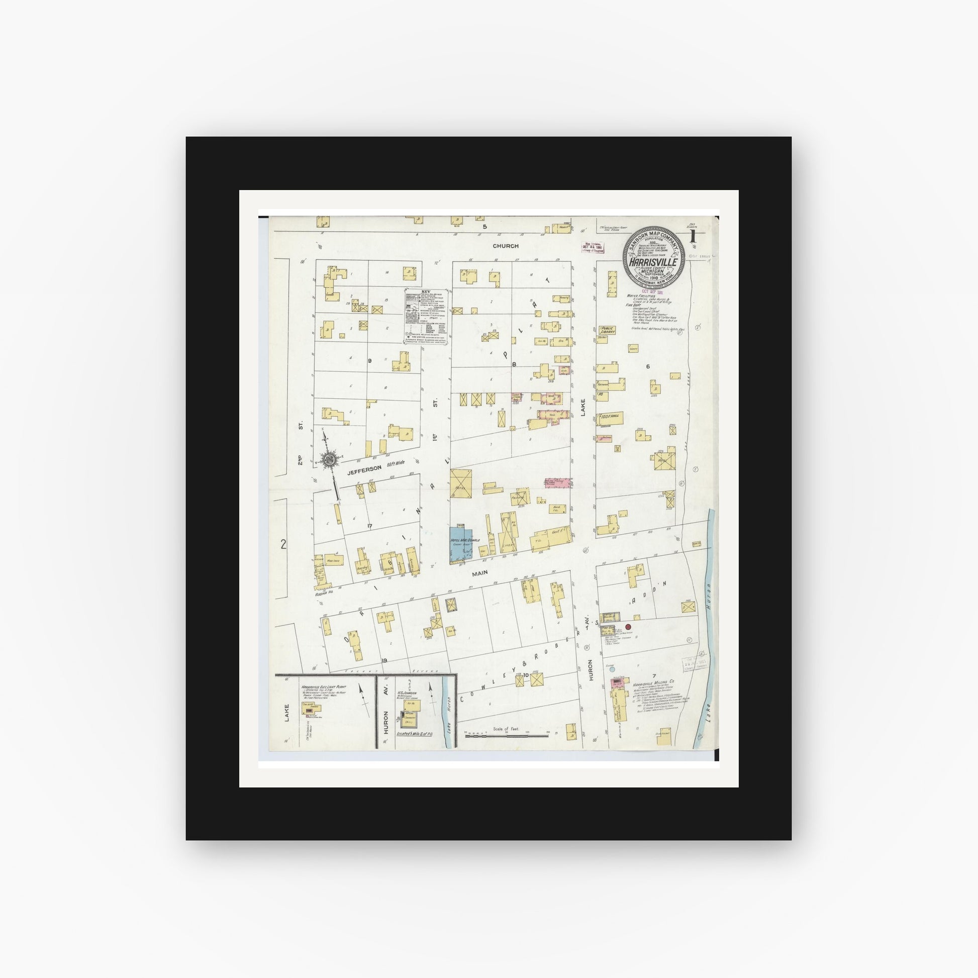 Old map wall art mockup — black gallery frame with white mat — Sanborn Fire Insurance Map from Harrisville, Alcona County, Michigan (1910) - Complete Map Set