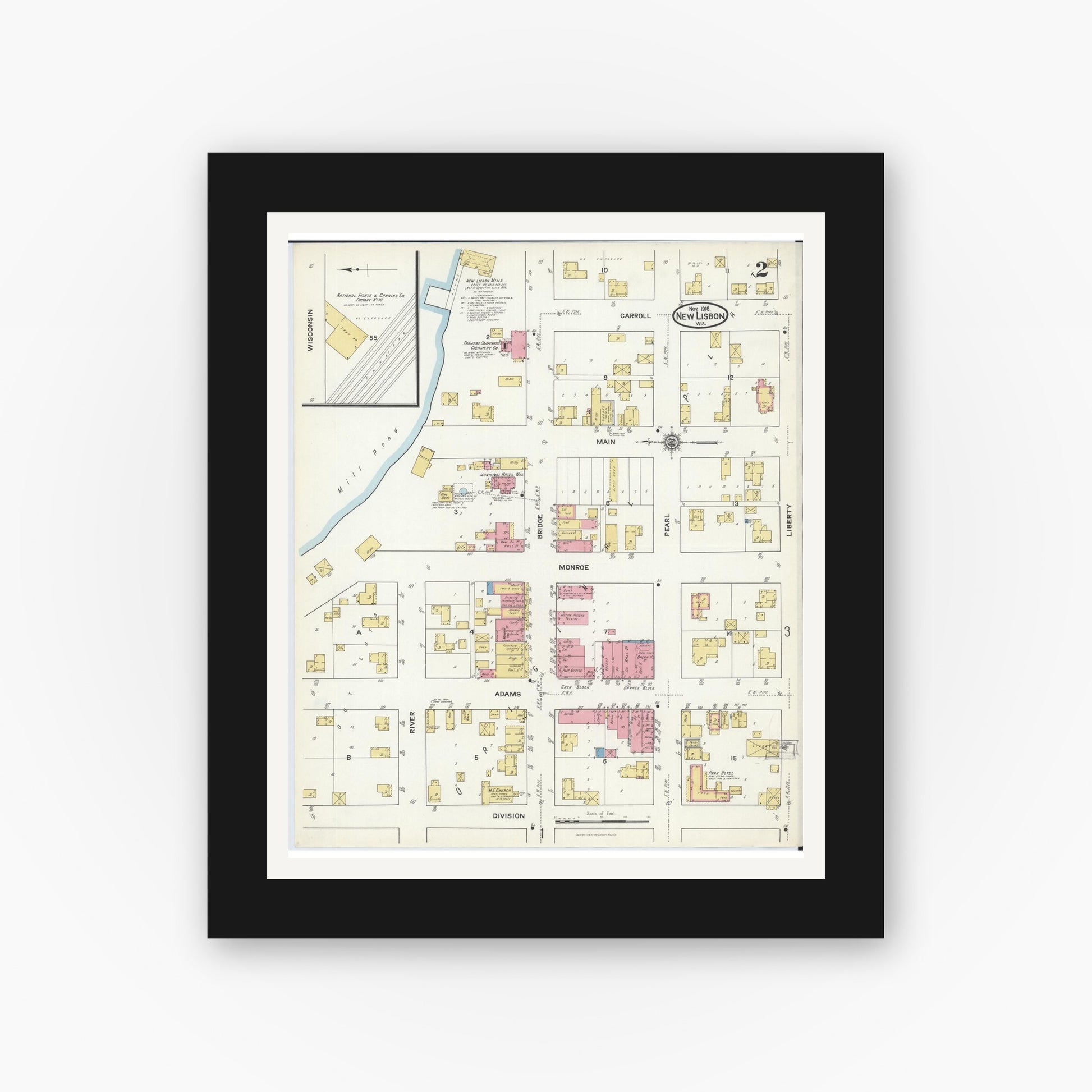 Old map wall art mockup — black gallery frame with white mat — Sanborn Fire Insurance Map from New Lisbon, Juneau County, Wisconsin (1916), Sheet #0002