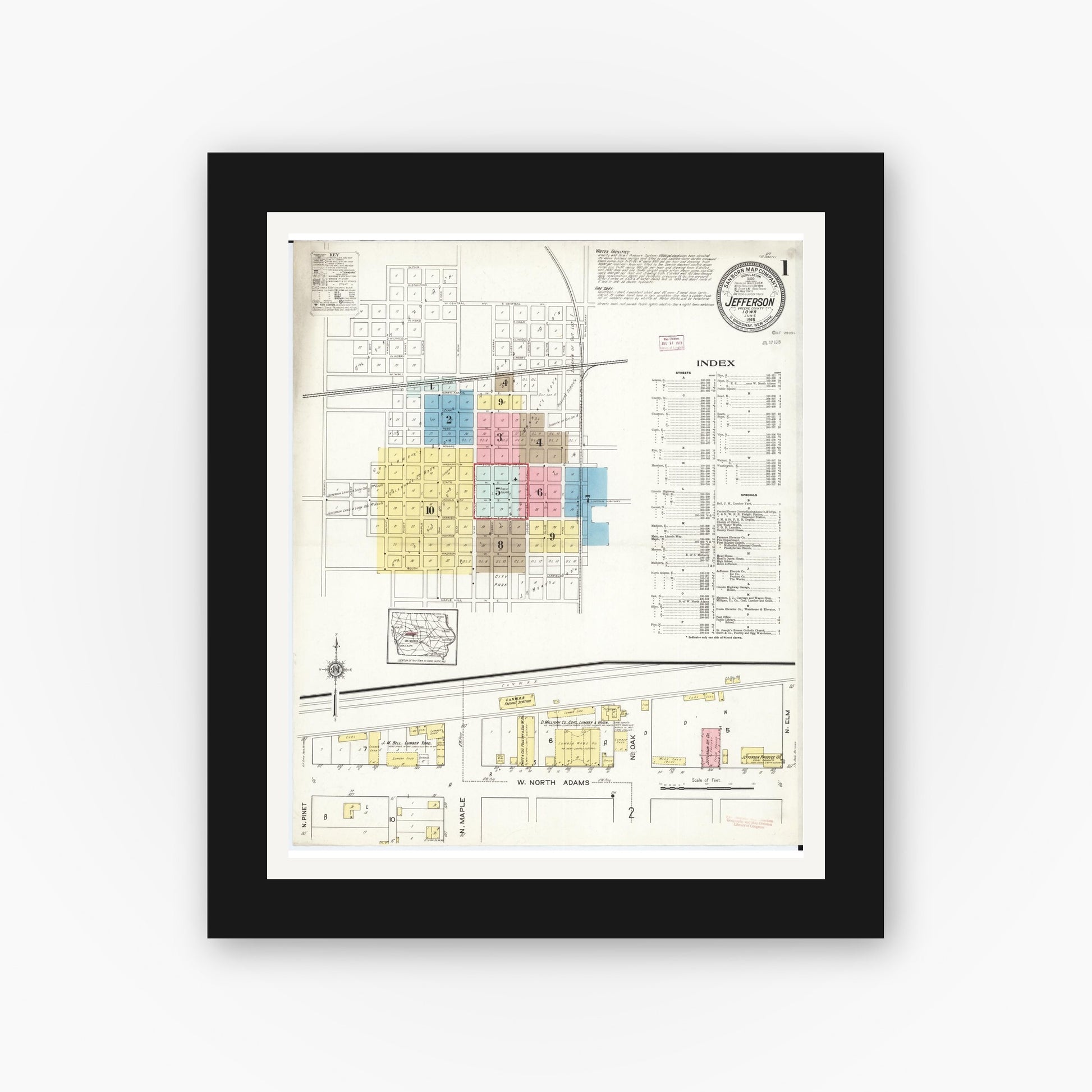 Old map wall art mockup — black gallery frame with white mat — Sanborn Fire Insurance Map from Jefferson, Greene County, Iowa (1915) â€” Complete Set