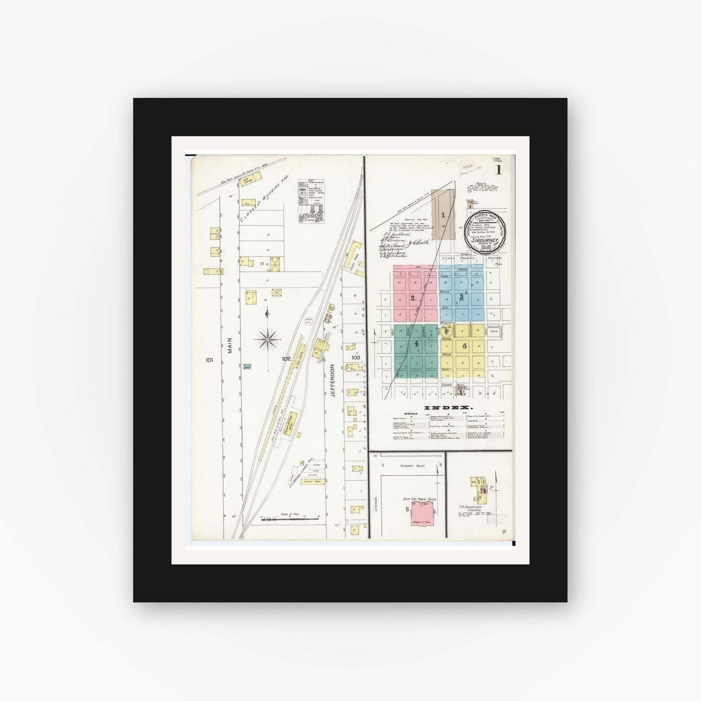 Old map wall art mockup — black gallery frame with white mat — Sanborn Fire Insurance Map from Sigourney, Kiokuk County, Iowa (1893), Sheet #0001