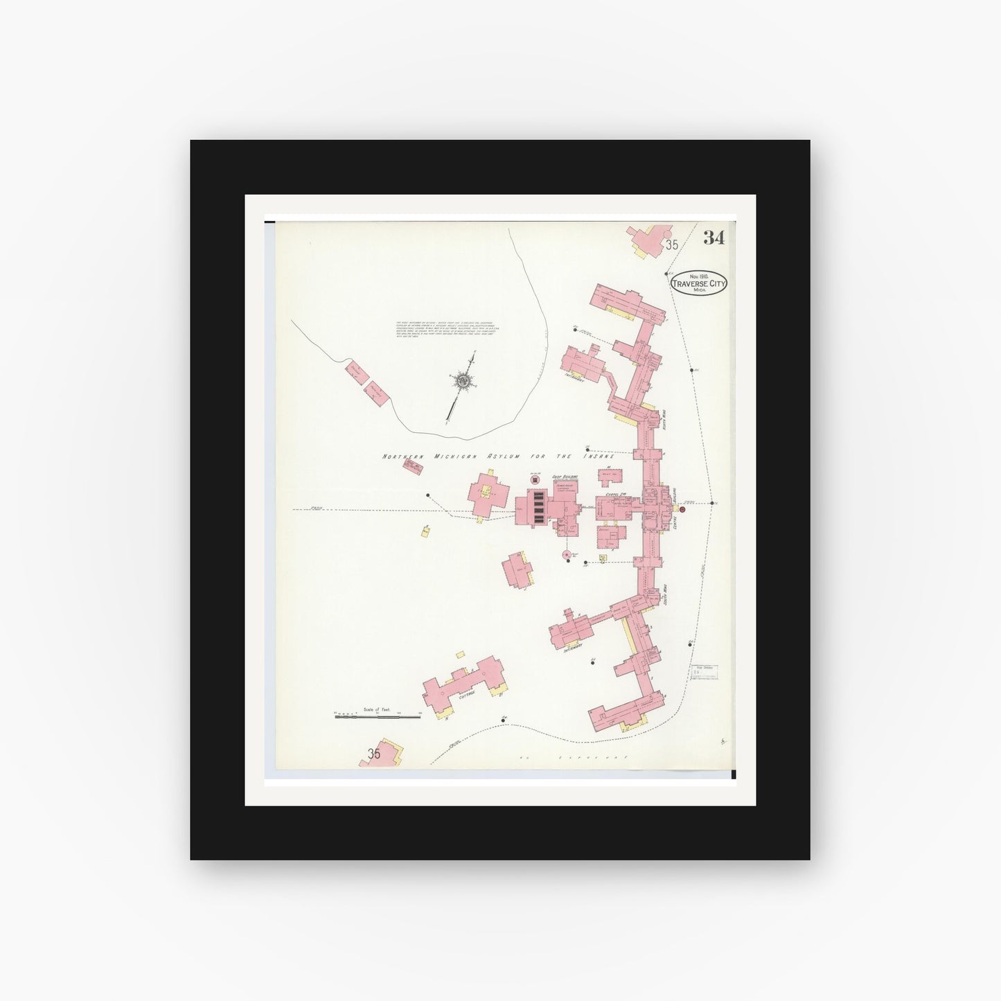 Old map wall art mockup — black gallery frame with white mat — Sanborn Fire Insurance Map from Traverse City, Grand Traverse County, Michigan (1910), Sheet #0034
