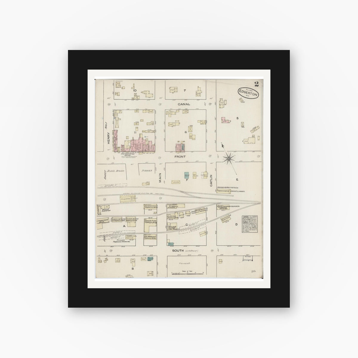Old map wall art mockup — black gallery frame with white mat — Sanborn Fire Insurance Map from Edgerton, Rock County, Wisconsin (1884), Sheet #0002