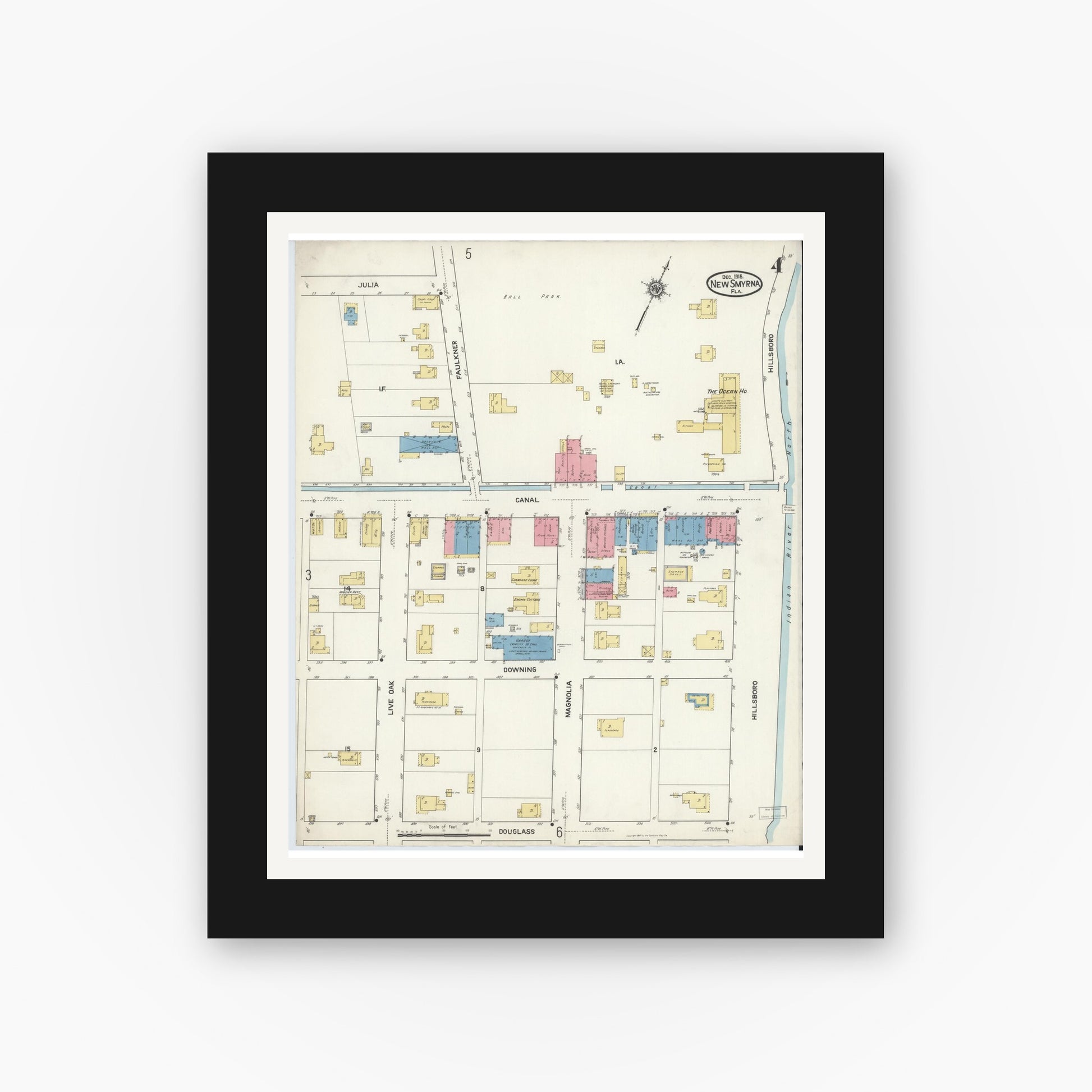 Old map wall art mockup — black gallery frame with white mat — Sanborn Fire Insurance Map from New Smyrna, Valusia County, Florida (1916), Sheet #0004
