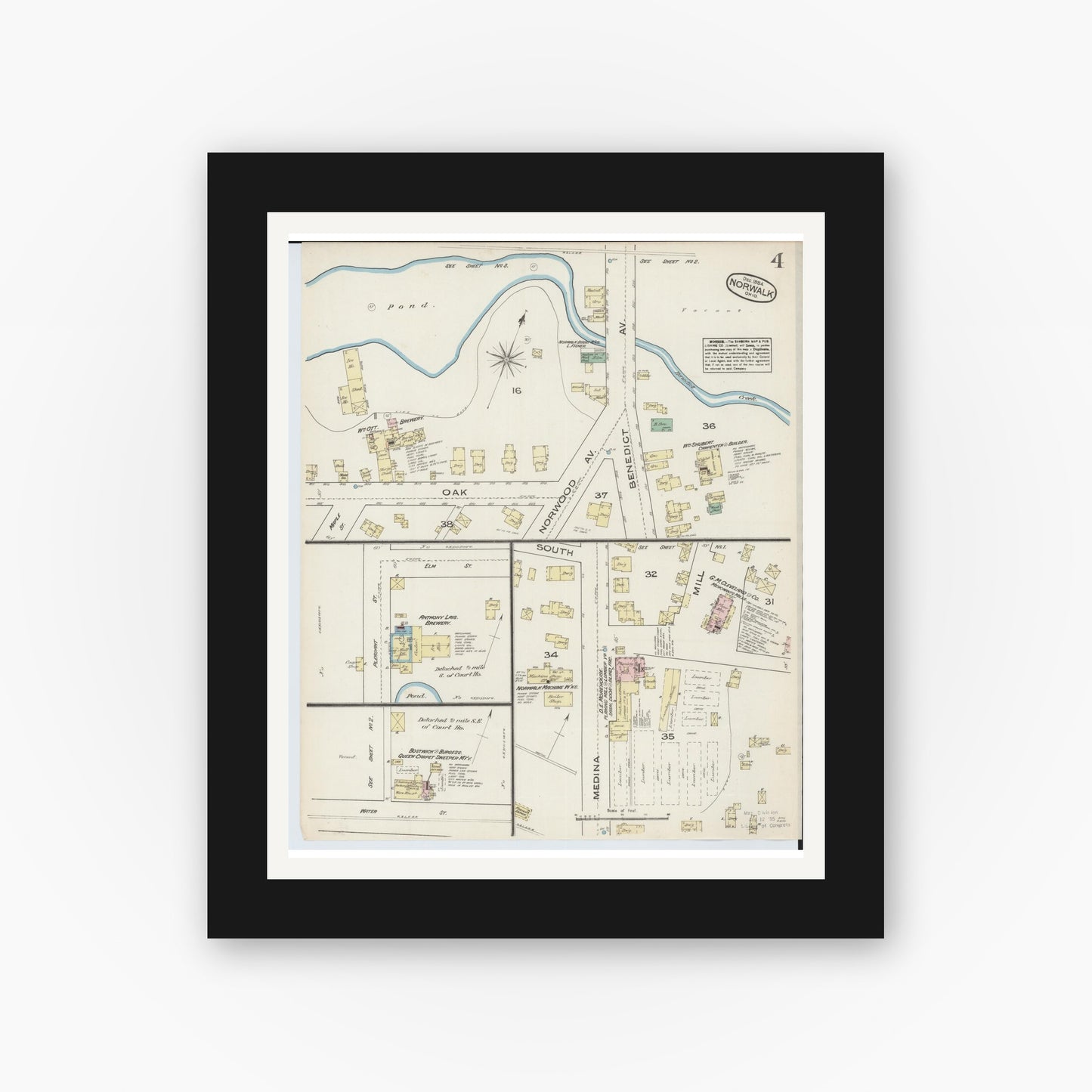 Old map wall art mockup — black gallery frame with white mat — Sanborn Fire Insurance Map from Norwalk, Huron County, Ohio (1884), Sheet #0004