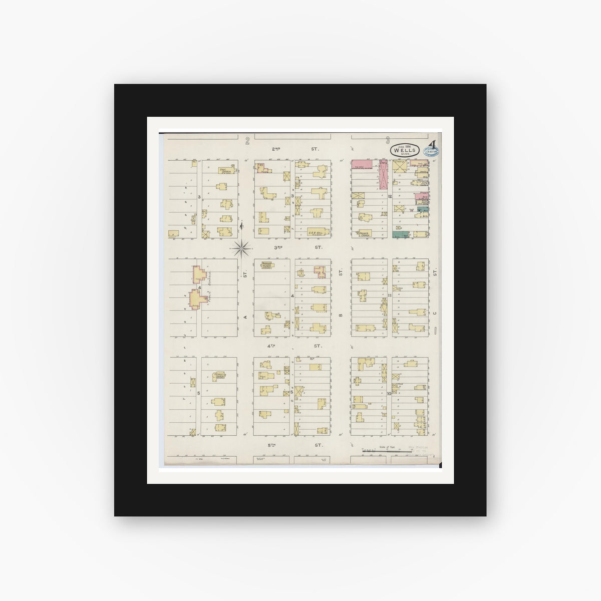 Old map wall art mockup — black gallery frame with white mat — Sanborn Fire Insurance Map from Wells, Faribault County, Minnesota (1894), Sheet #0004