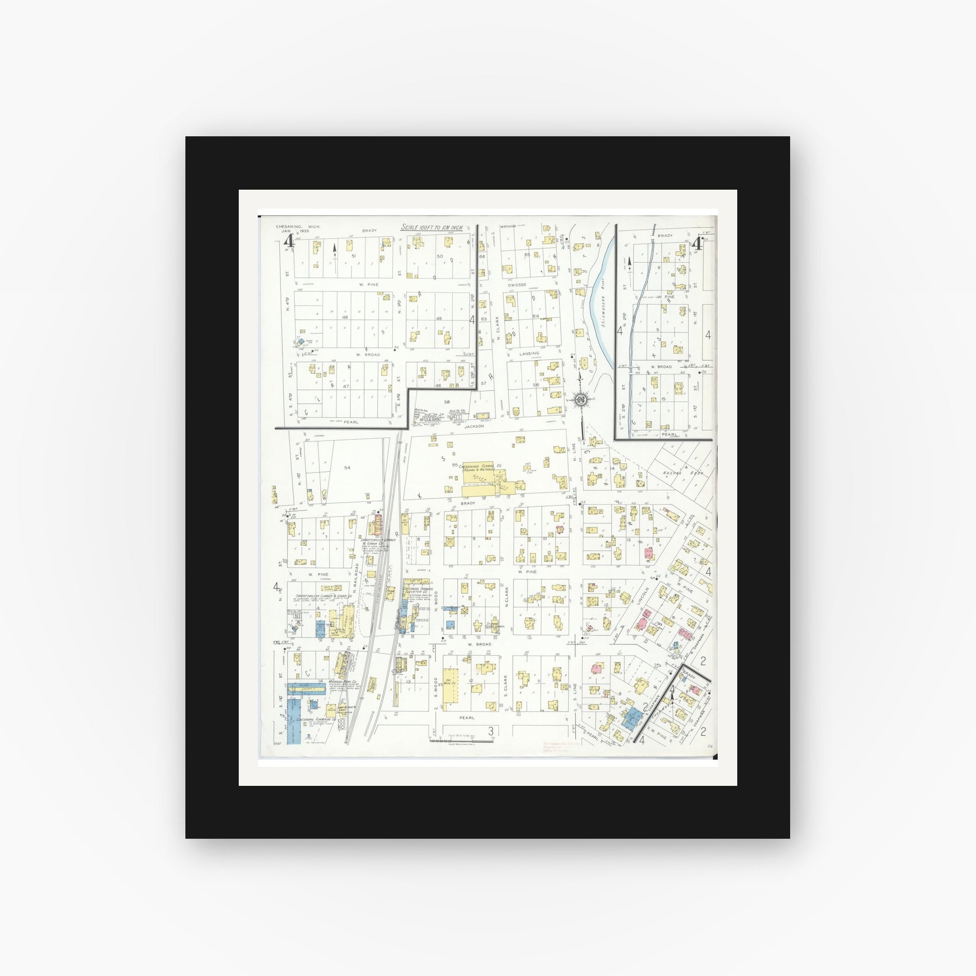 Old map wall art mockup — black gallery frame with white mat — Sanborn Fire Insurance Map from Chesaning, Saginaw County, Michigan (1935), Sheet #0004