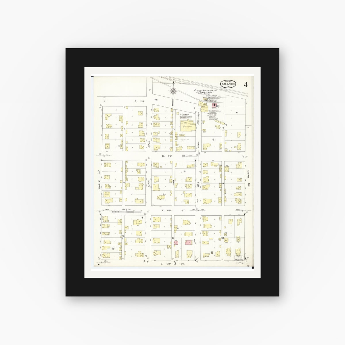 Old map wall art mockup — black gallery frame with white mat — Sanborn Fire Insurance Map from Atlantic, Cass County, Iowa (1913), Sheet #0004