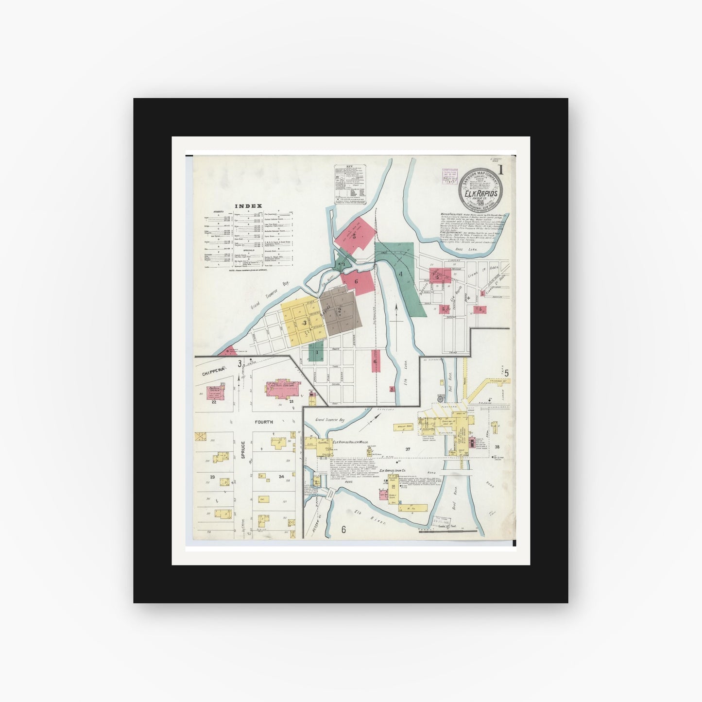 Old map wall art mockup — black gallery frame with white mat — Sanborn Fire Insurance Map from Elk Rapids, Antrim County, Michigan (1907) - Complete Map Set