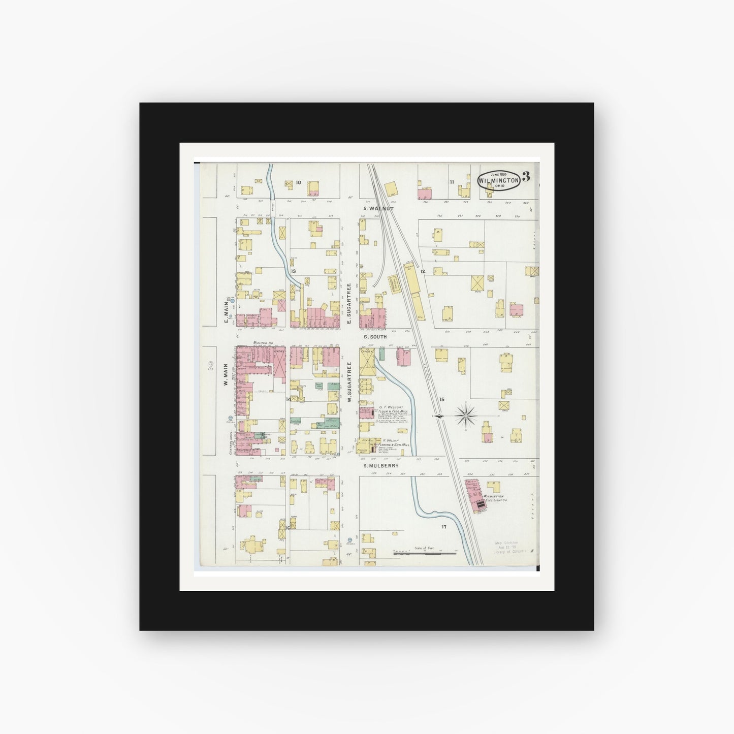 Old map wall art mockup — black gallery frame with white mat — Sanborn Fire Insurance Map from Wilmington, Clinton County, Ohio (1895), Sheet #0003