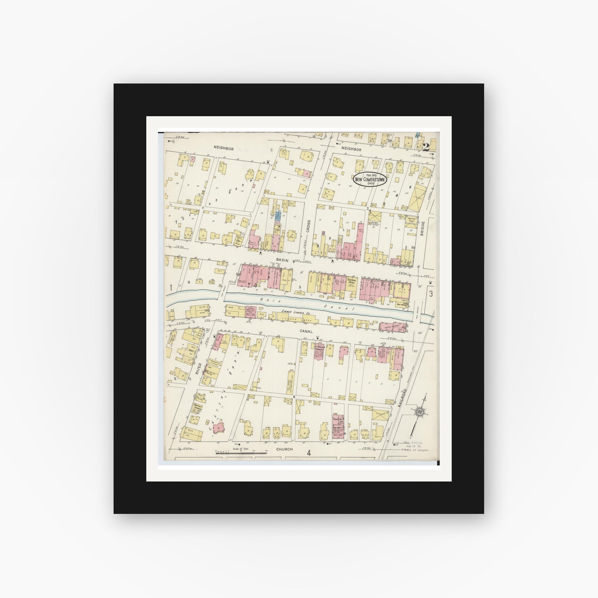 Old map wall art mockup — black gallery frame with white mat — Sanborn Fire Insurance Map from Newcomerstown, Tuscarawas County, Ohio (1915), Sheet #0002