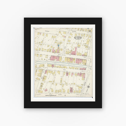Old map wall art mockup — black gallery frame with white mat — Sanborn Fire Insurance Map from Newcomerstown, Tuscarawas County, Ohio (1915), Sheet #0002