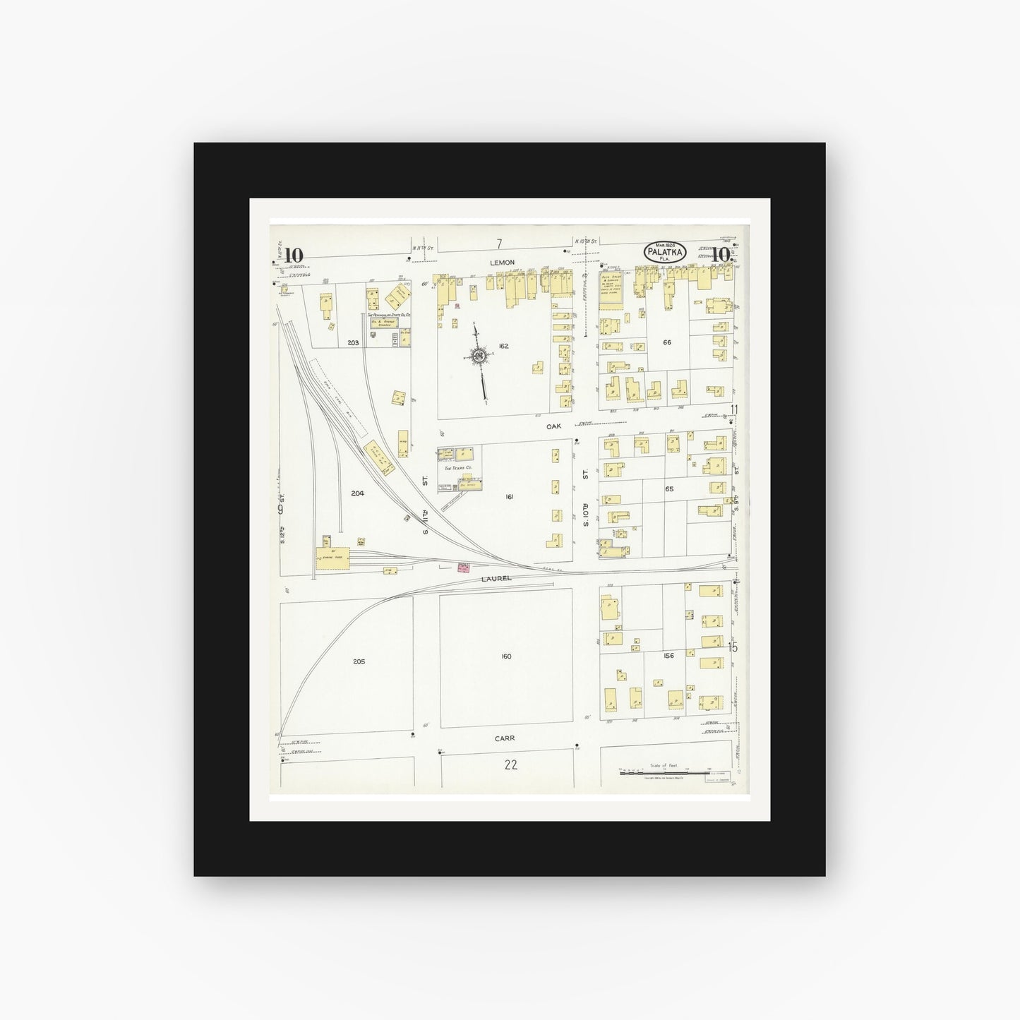 Old map wall art mockup — black gallery frame with white mat — Sanborn Fire Insurance Map from Palatka, Putnam County, Florida (1924), Sheet #0010